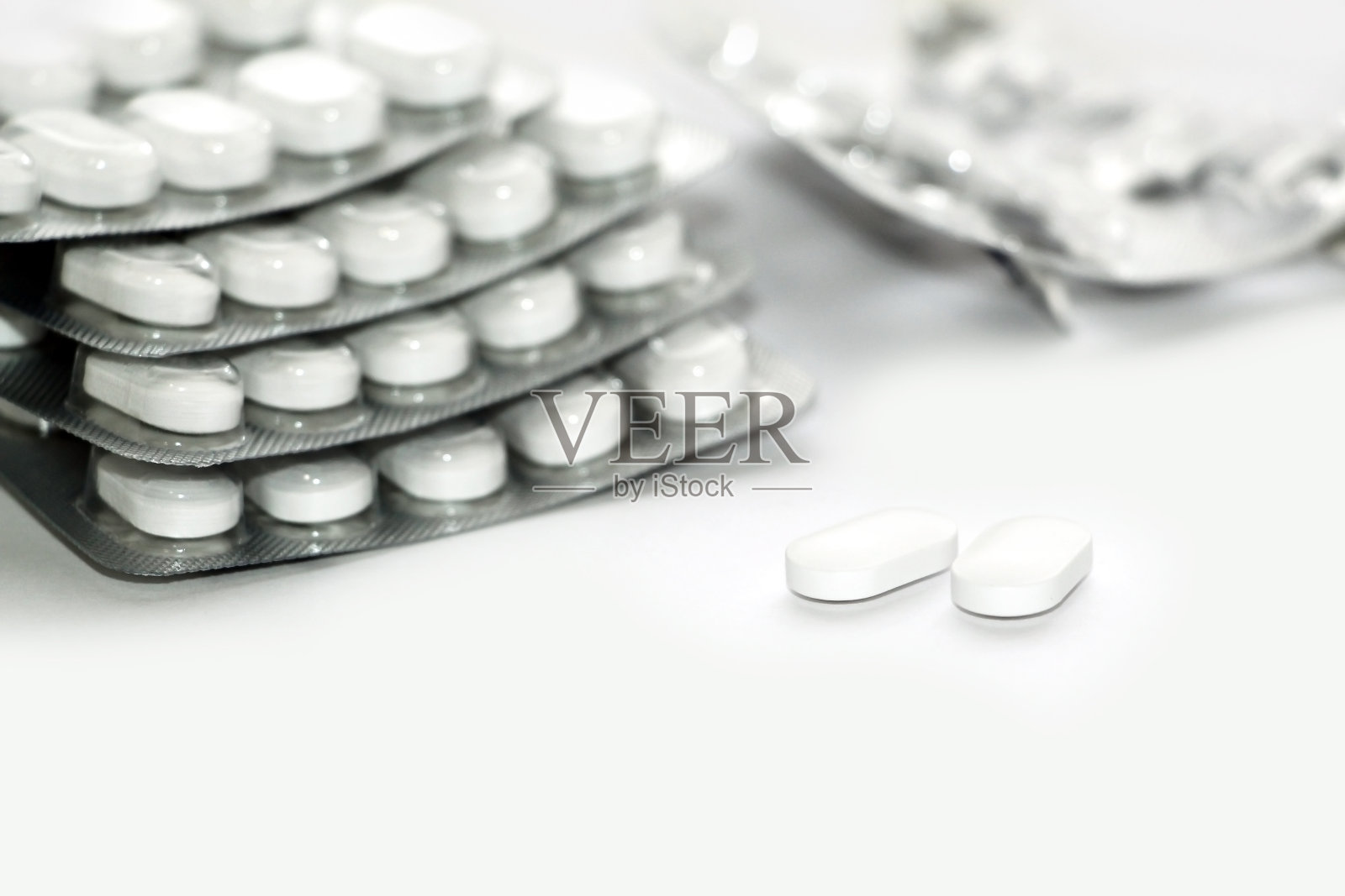 白色的药片。照片摄影图片