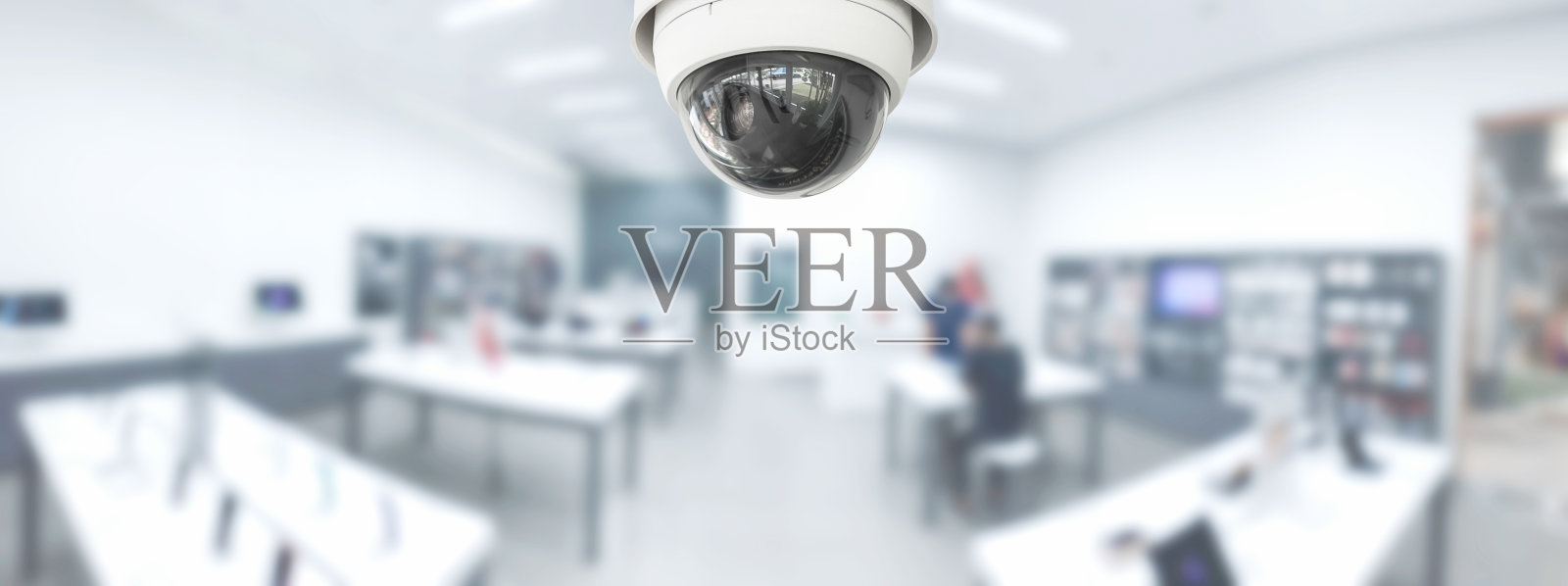 闭路电视安全全景与商店商店模糊的背景。照片摄影图片