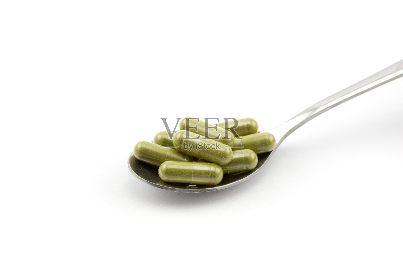 中药匙胶囊照片摄影图片