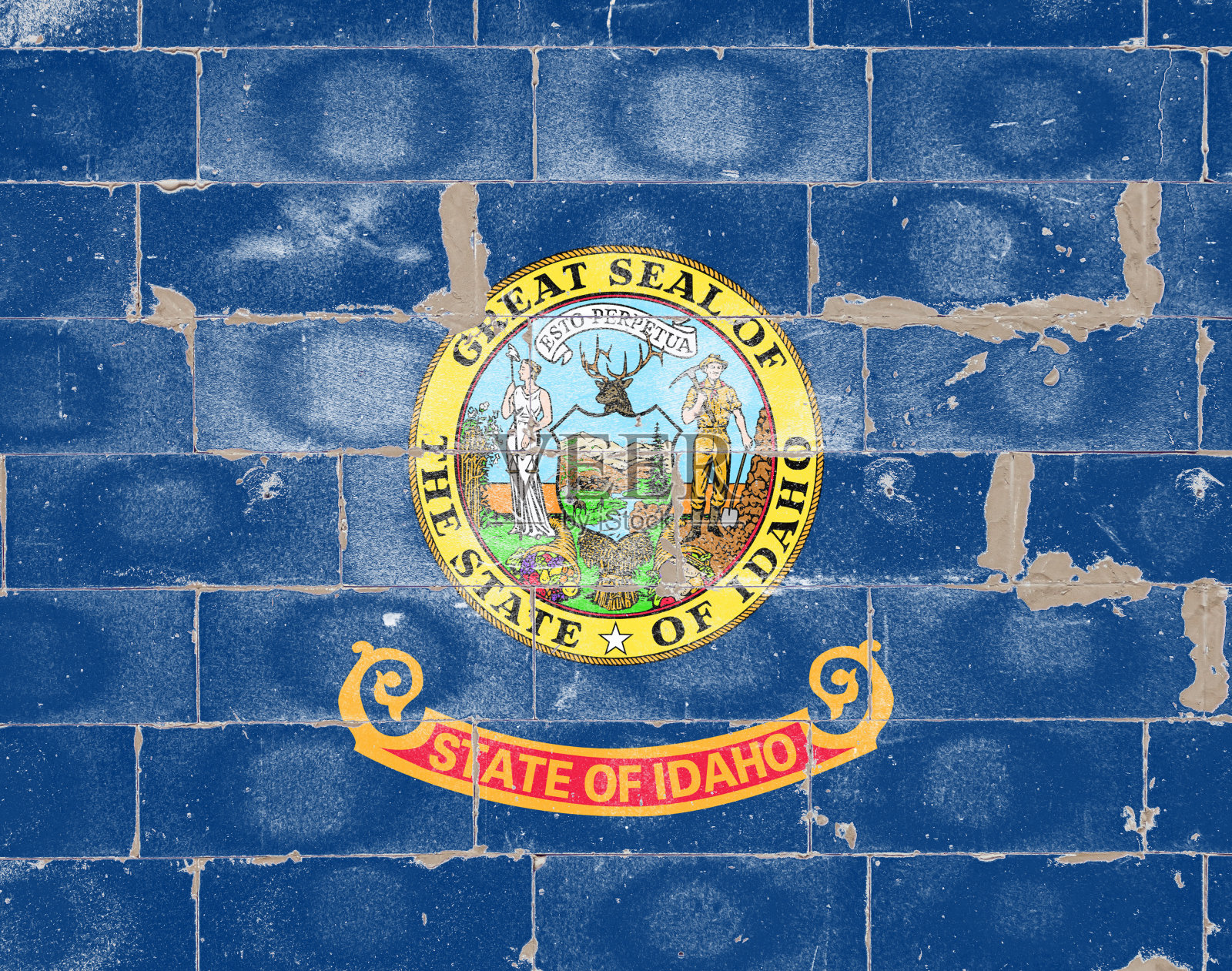 美国国旗爱达荷州在美国独立日的砖墙上用剥落的油漆。政治和宗教纠纷，海关和运输。照片摄影图片