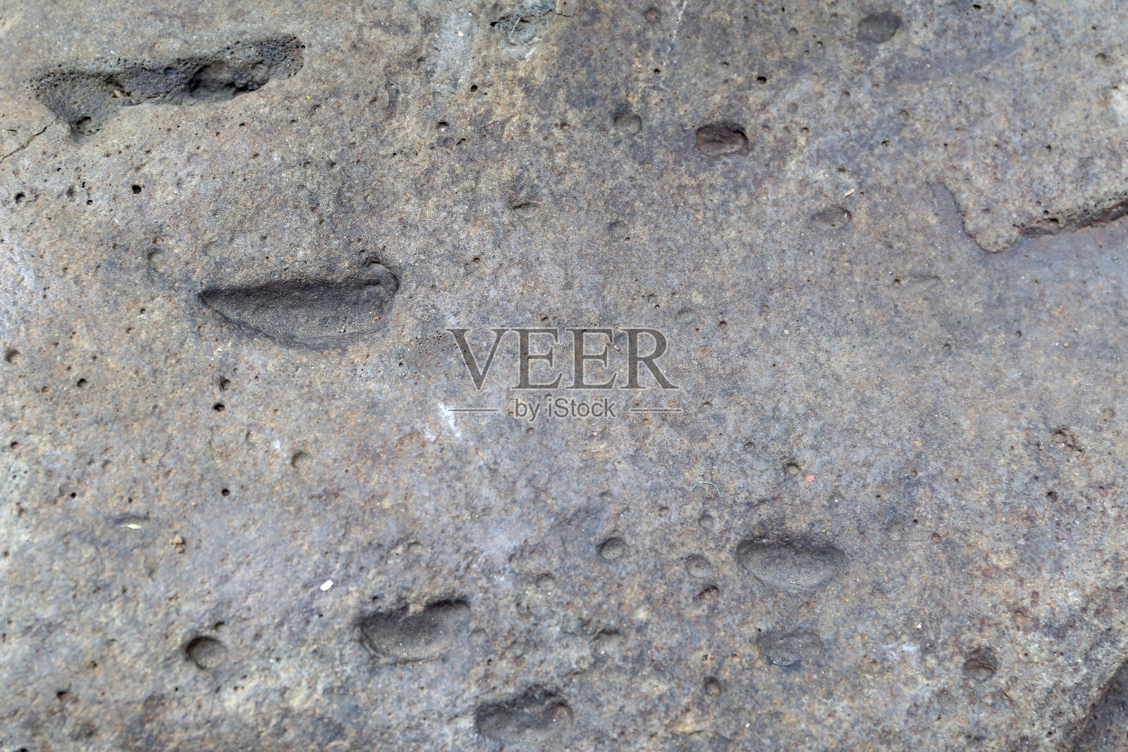 灰色石材抽象纹理背景。特写grunge背景文字。照片摄影图片