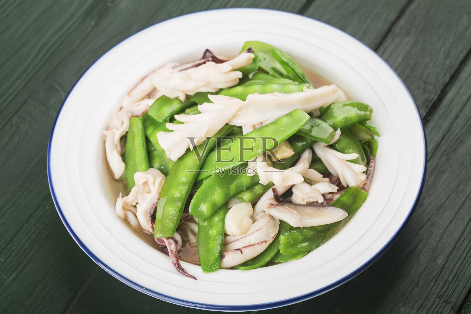 荷兰豆炒鱿鱼照片摄影图片