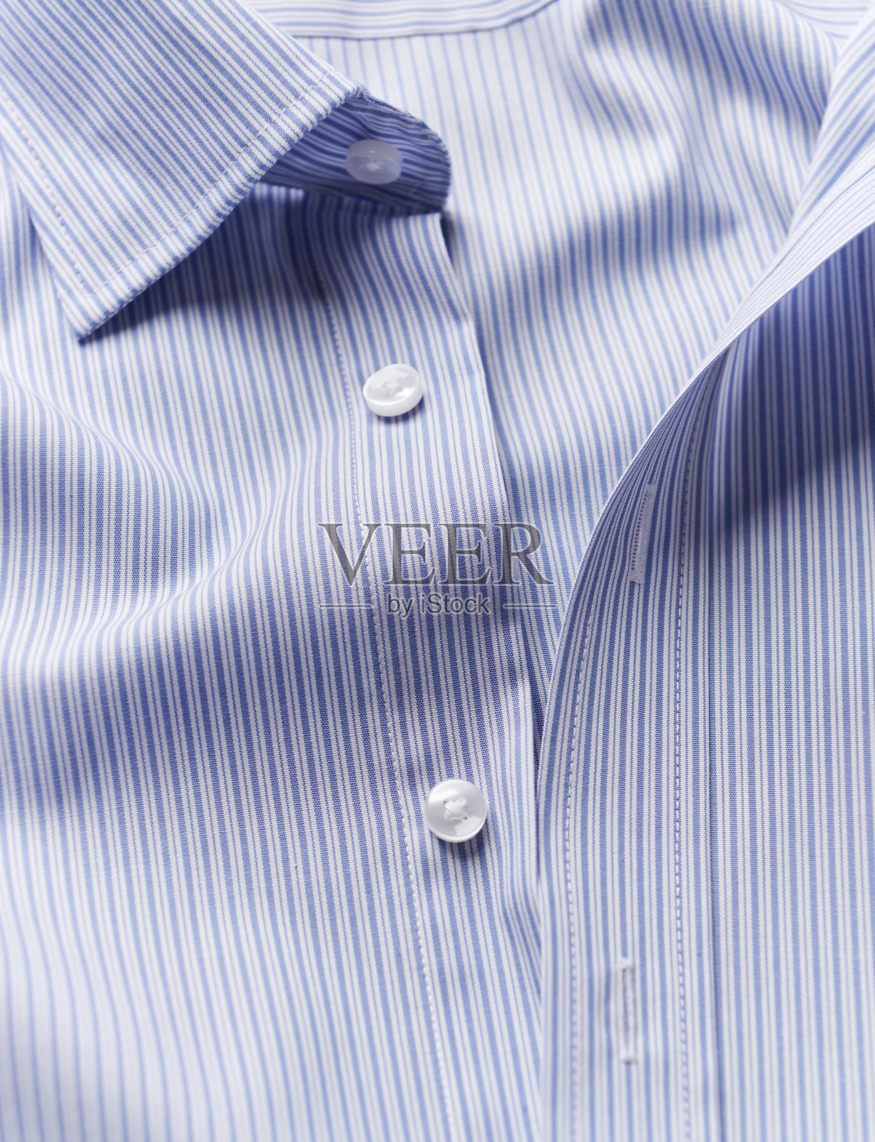 男子条纹衬衫的特写。副本的空间。照片摄影图片