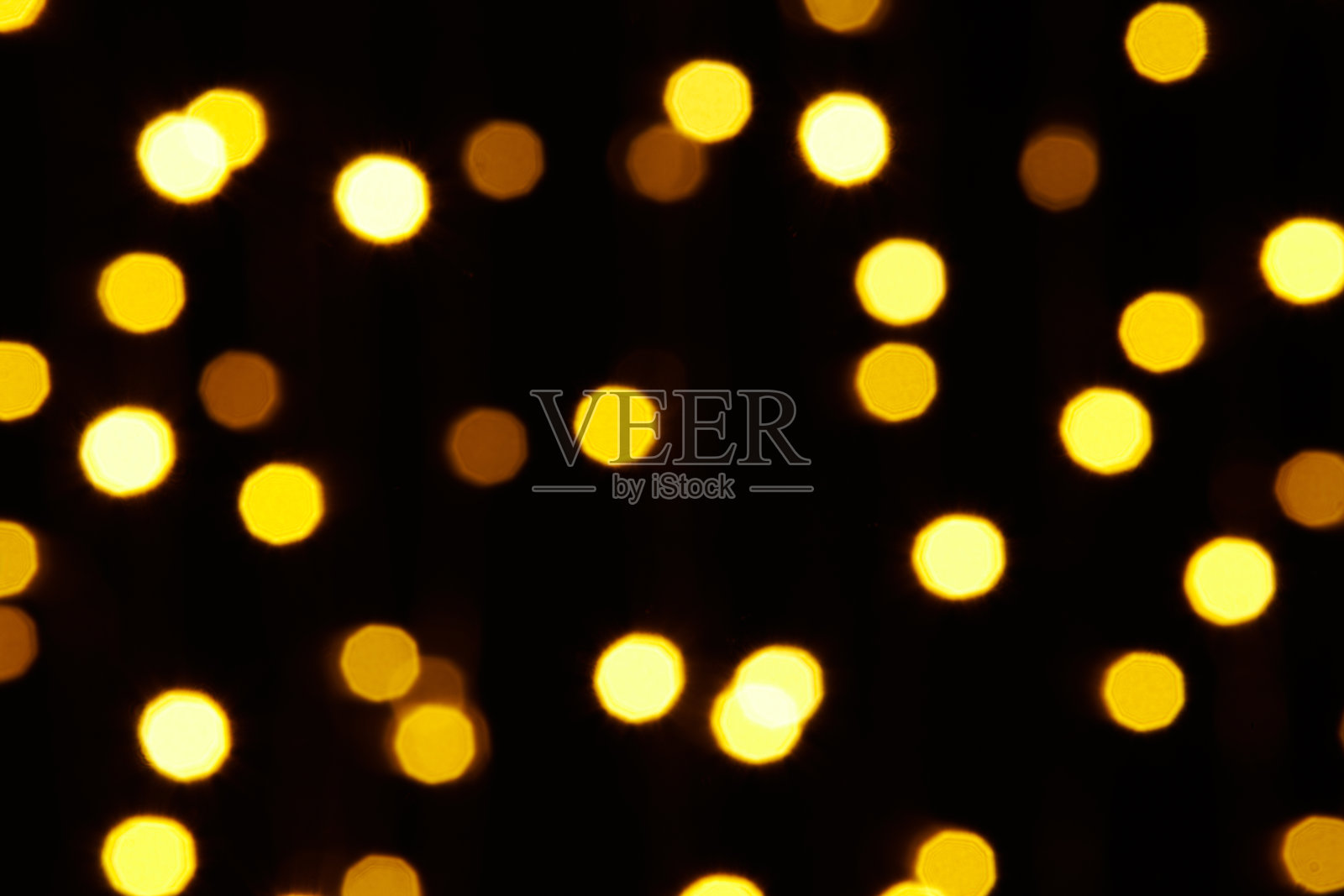 抽象背景-黄色散景在黑色上的照片照片摄影图片