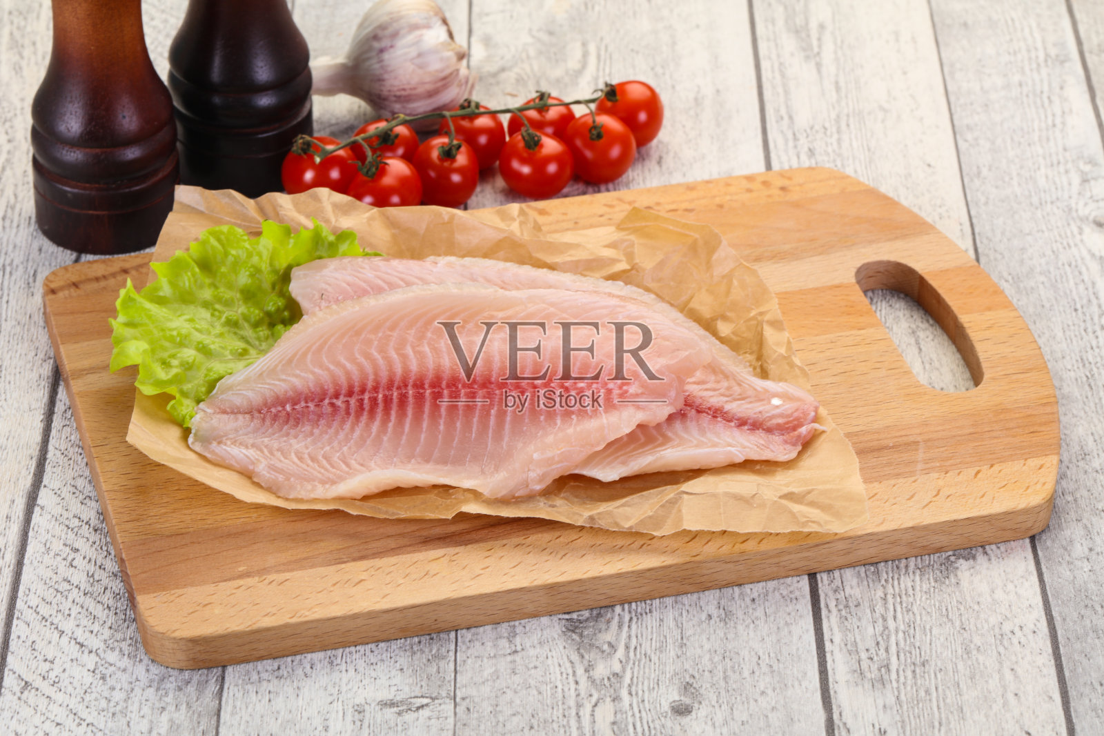 生罗非鱼鱼照片摄影图片