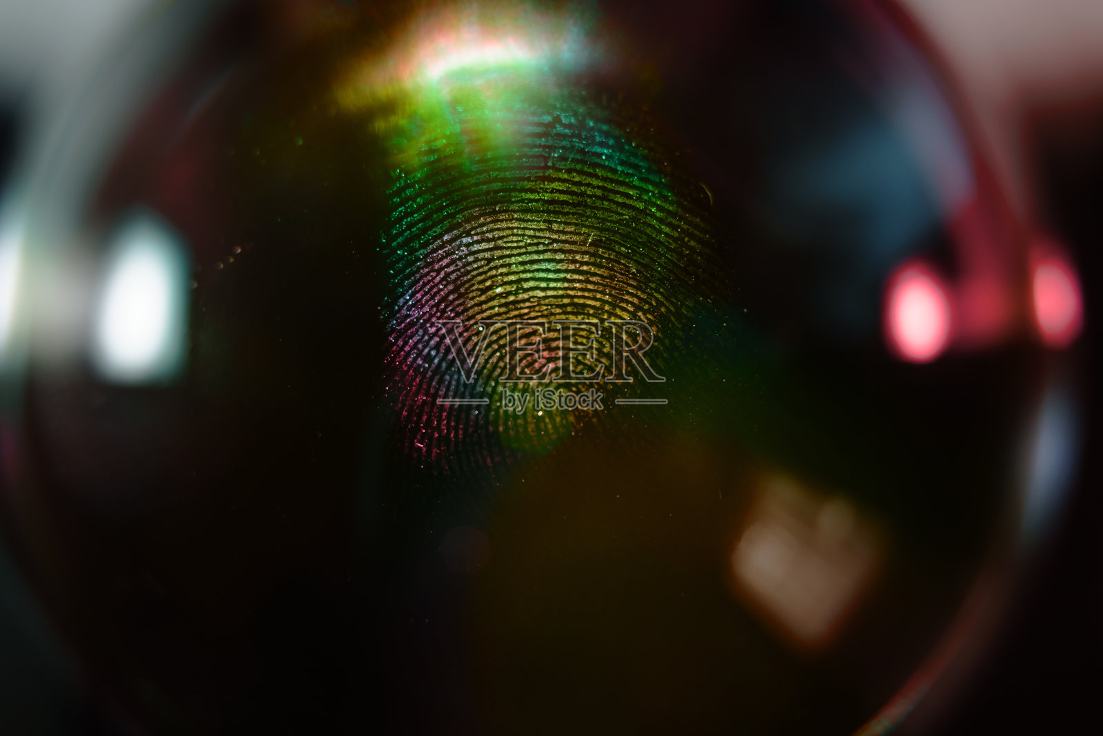 近距离的美丽抽象多色指纹的背景纹理设计。微距摄影的看法。照片摄影图片