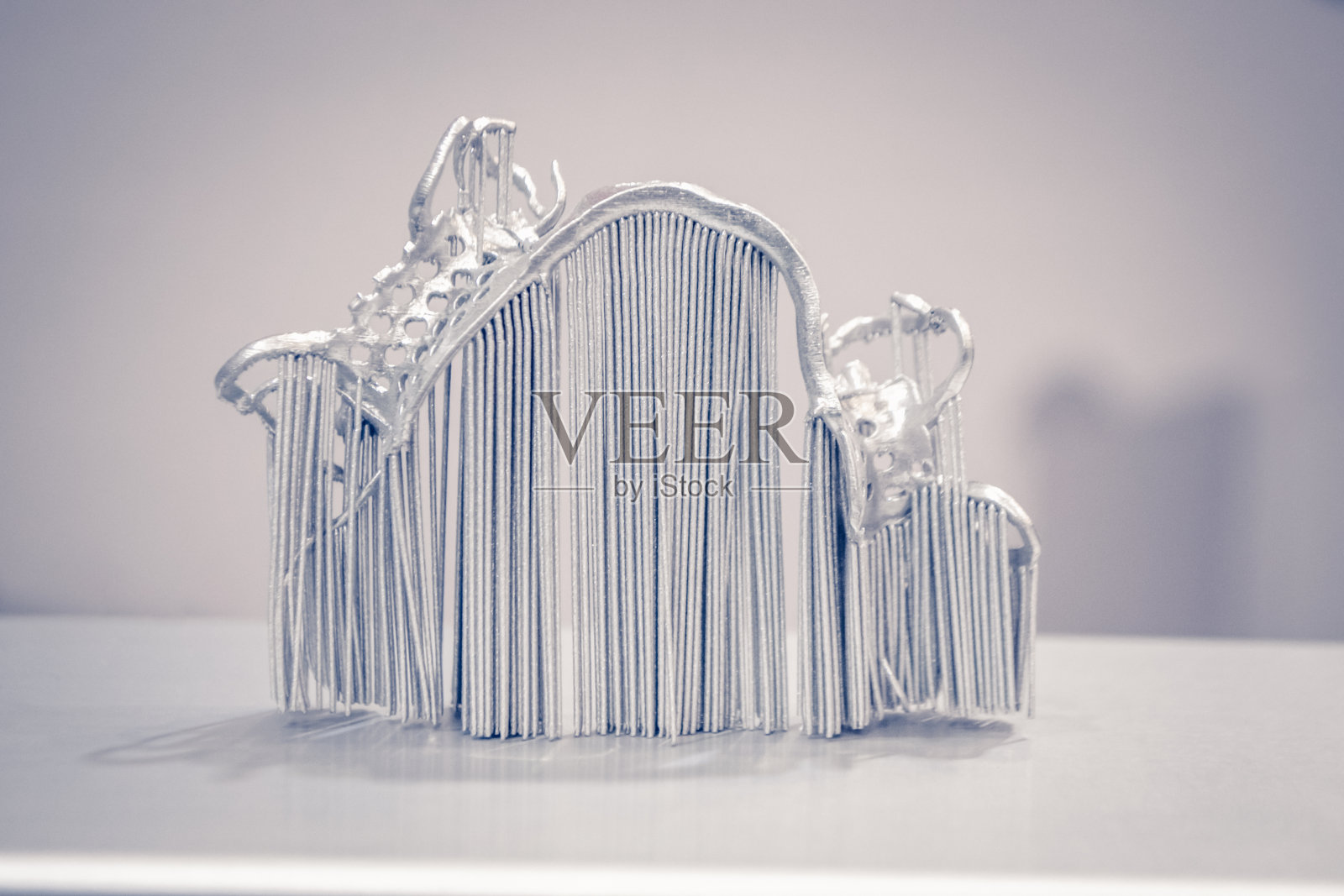 金属3D打印机打印的金属粉末物体照片摄影图片