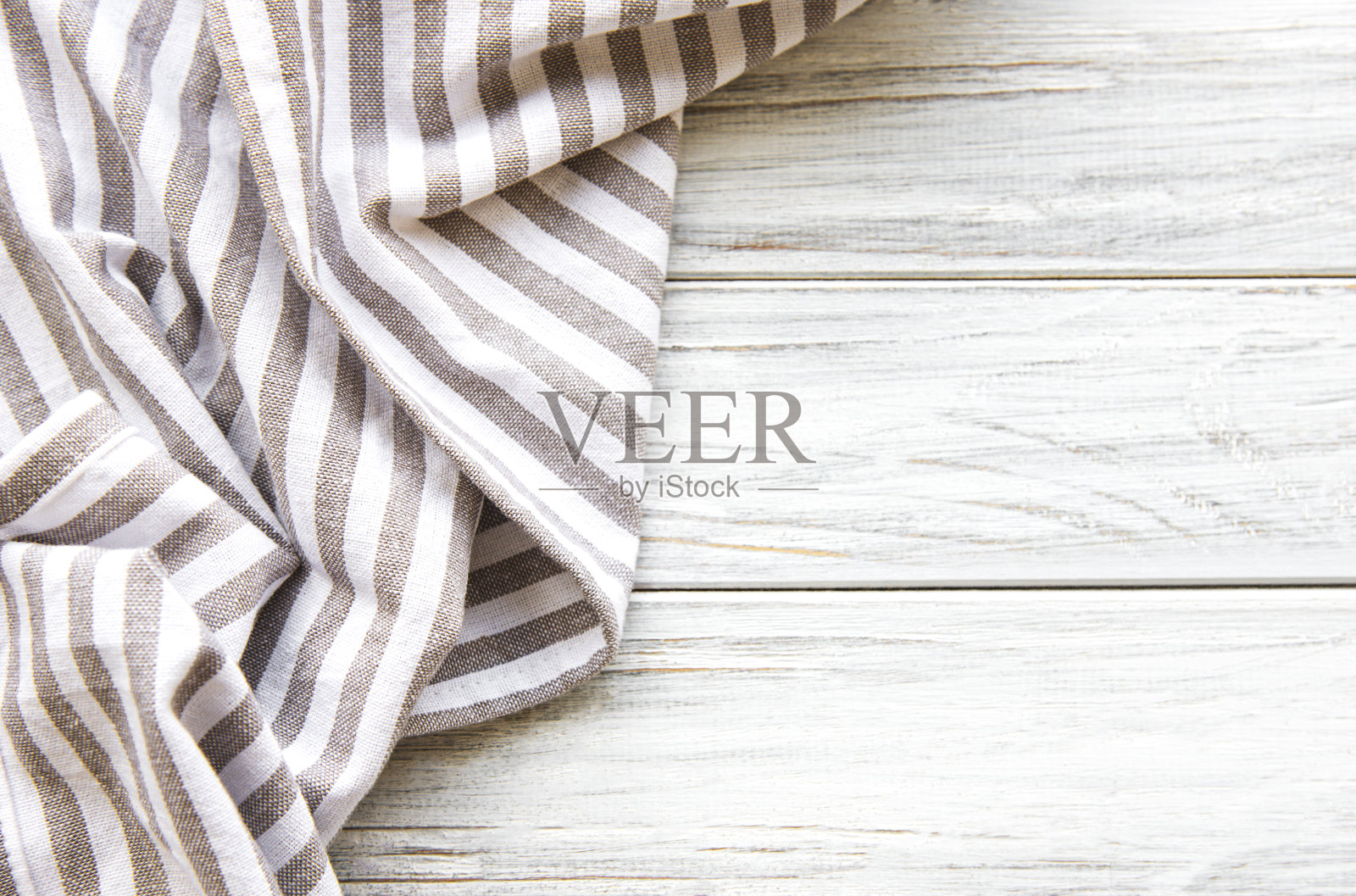 厨房餐巾放在木桌上照片摄影图片