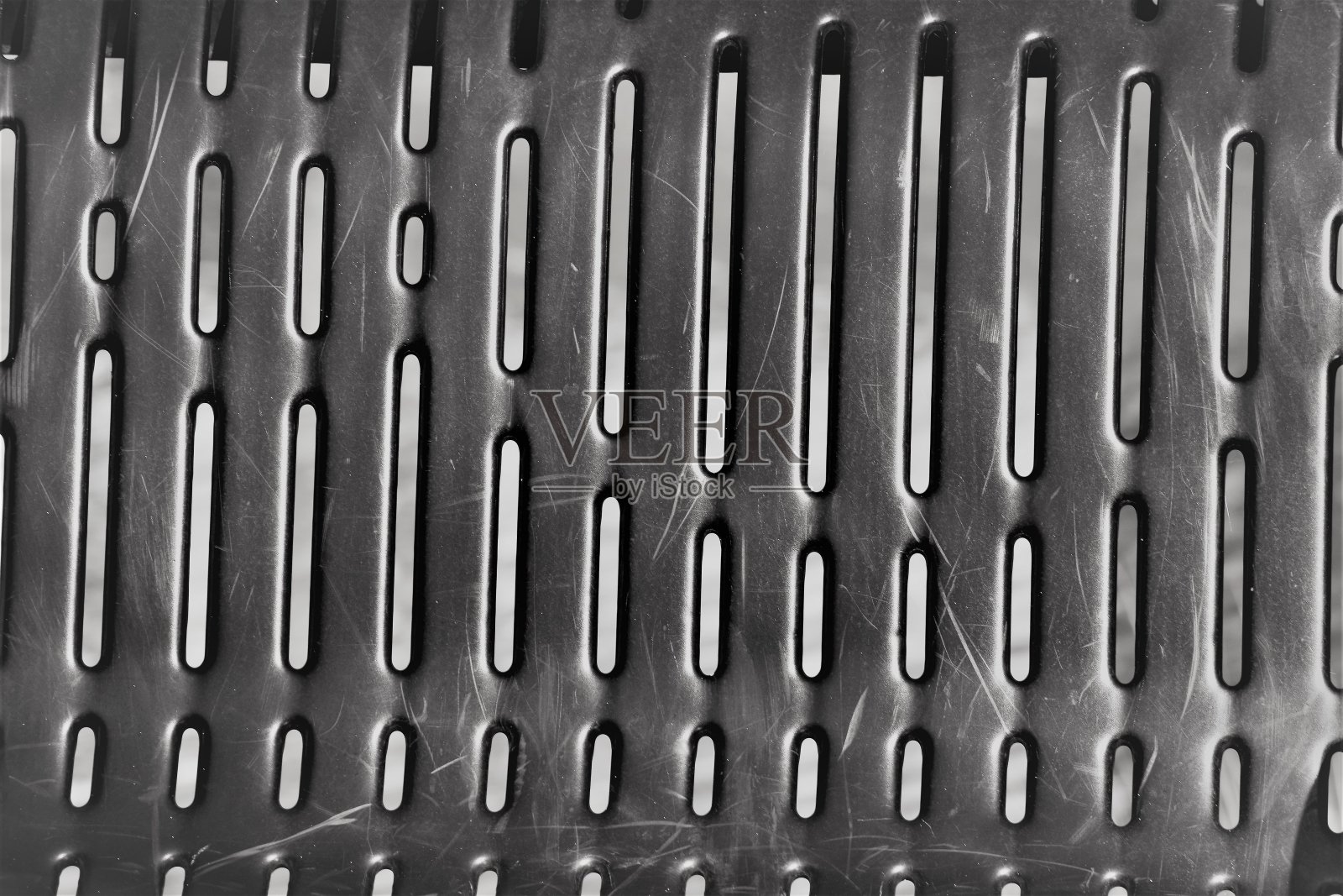 有趣的抽象垂直图案，黑色金属。照片摄影图片