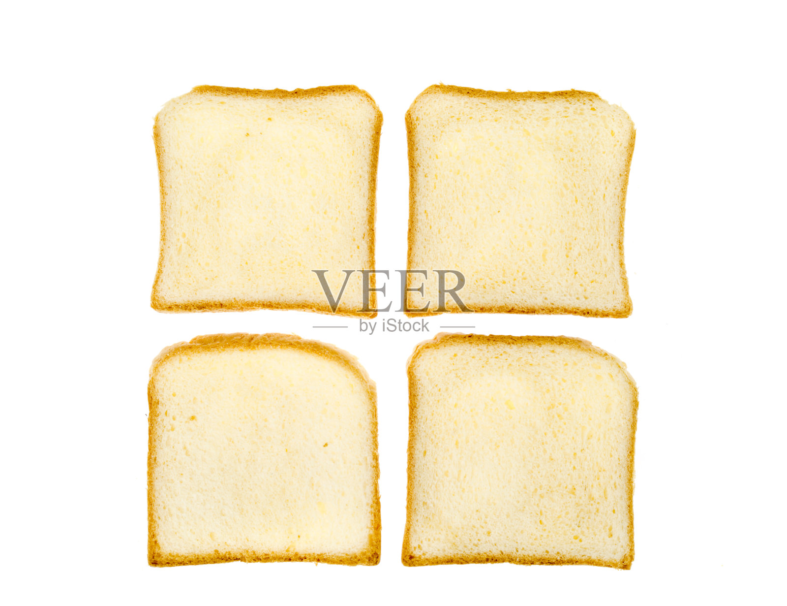 一块块方形的烤小麦面包孤立在白色的背景上。照片摄影图片