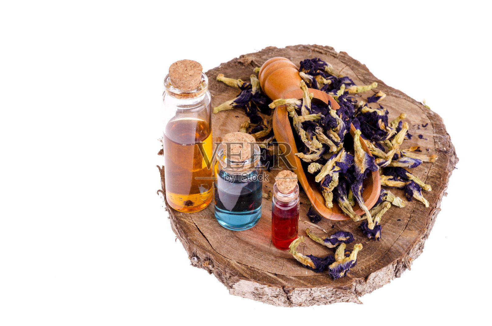 由干燥原料制成的按摩油，芳香疗法和完全放松的鲜花。照片摄影图片
