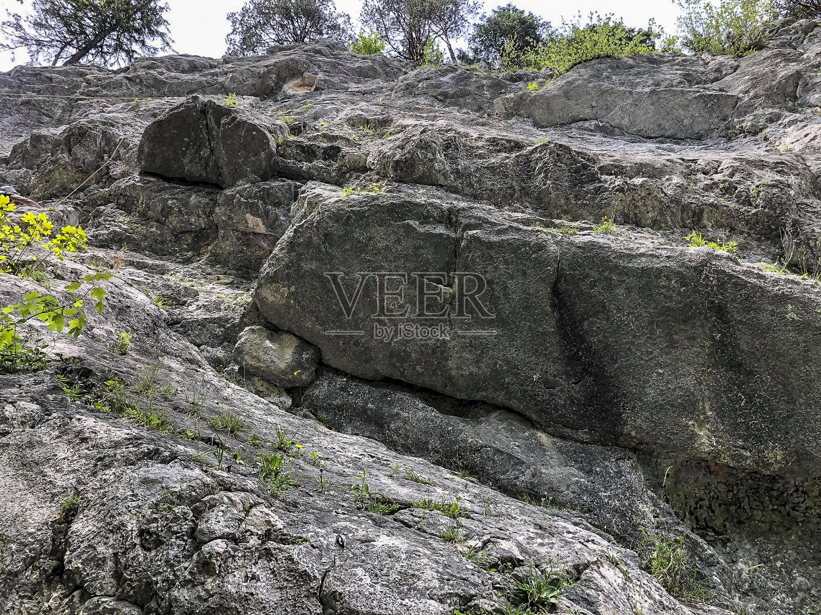 一块用来攀岩的大岩石照片摄影图片