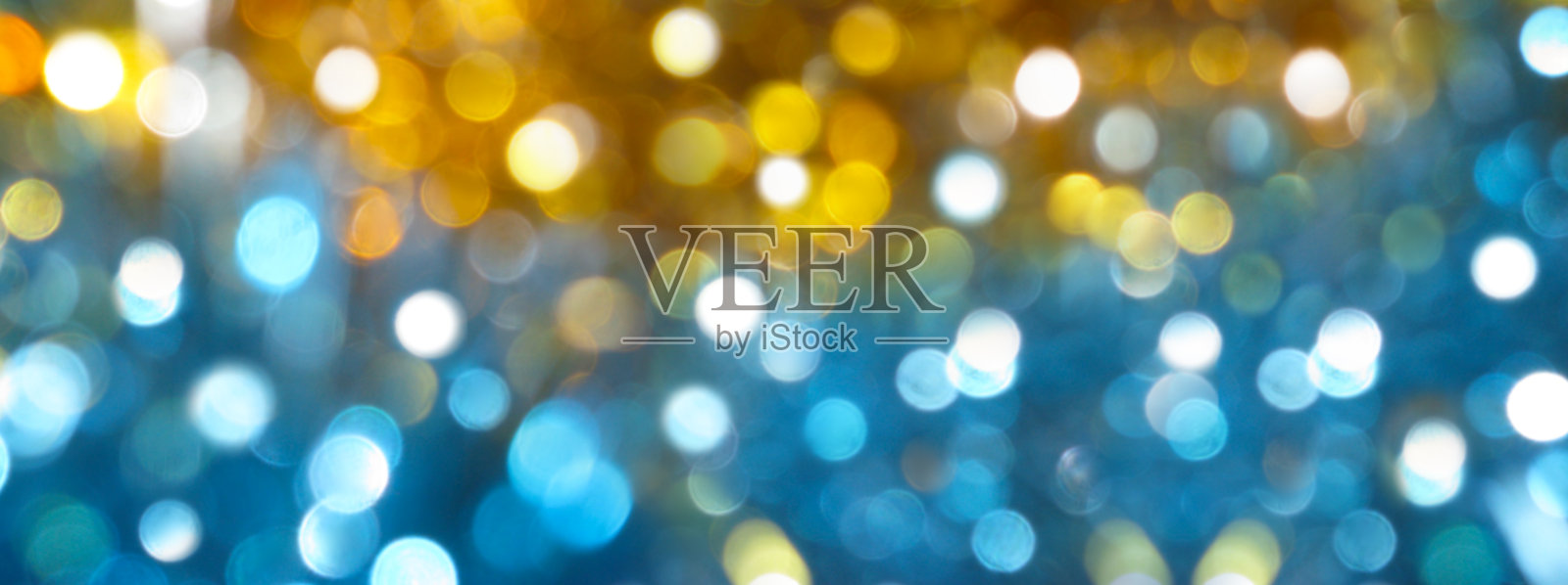 节日模糊散焦背景，亮圈，散焦，彩灯，趣味，派对，辉光效果，金色，蓝色，图案，圣诞照片摄影图片