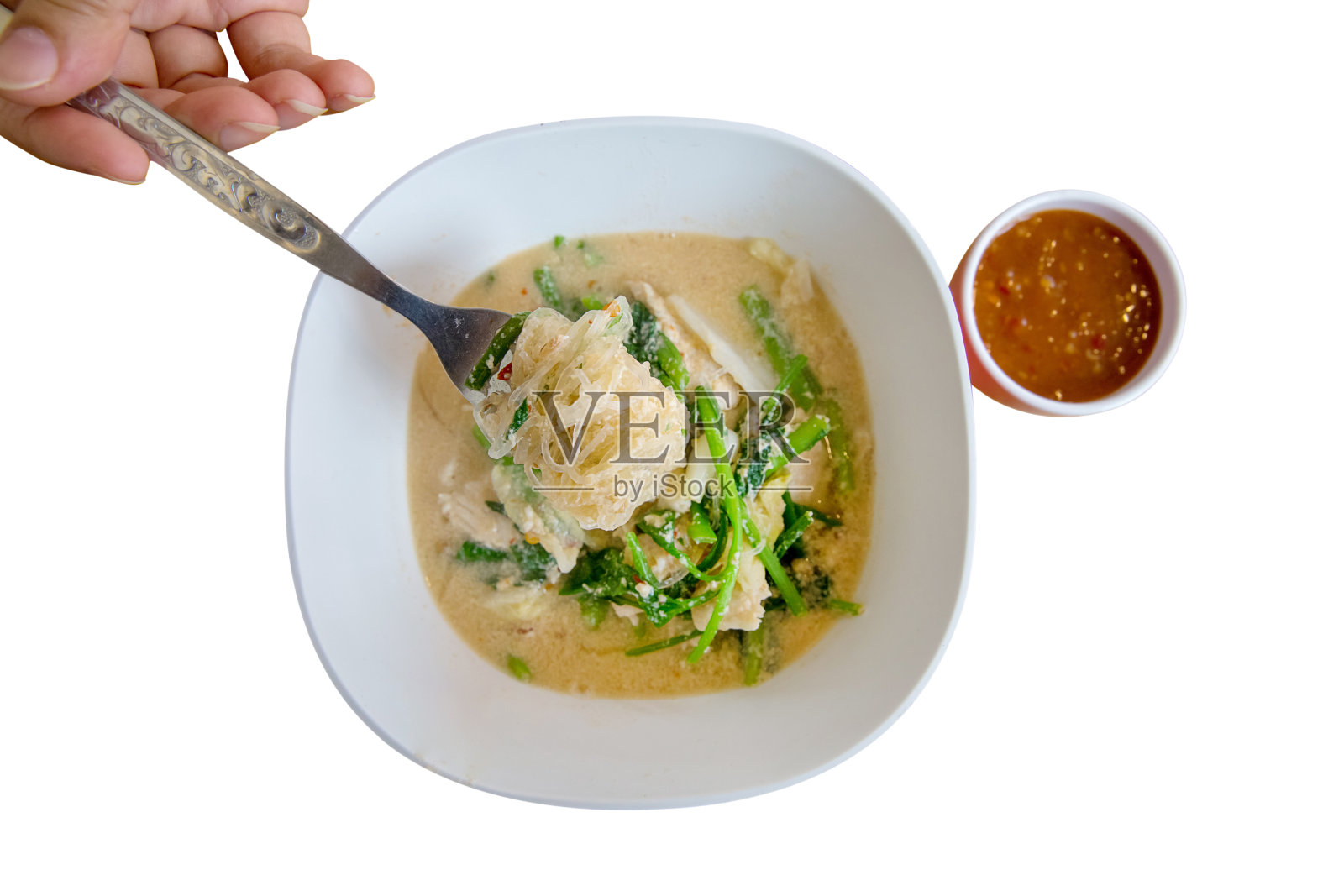 俯视图苏琪在肉汤在白碗，重点选择。照片摄影图片