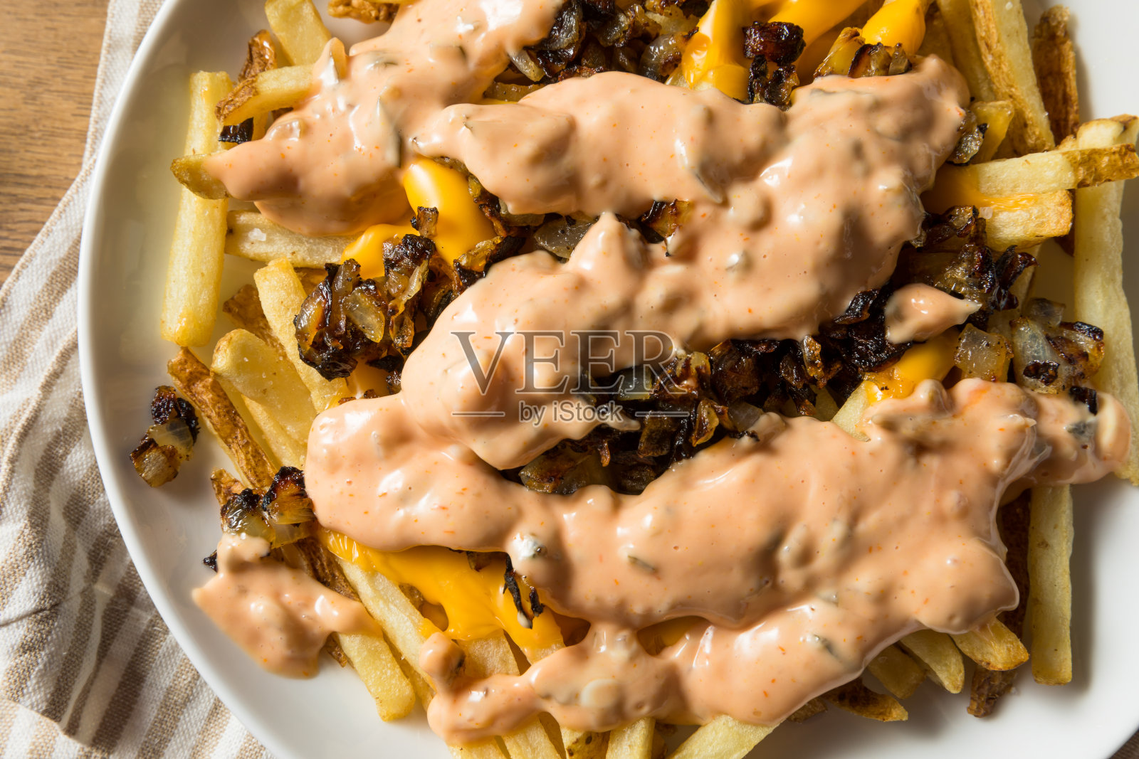 自制的油炸动物奶酪薯条照片摄影图片