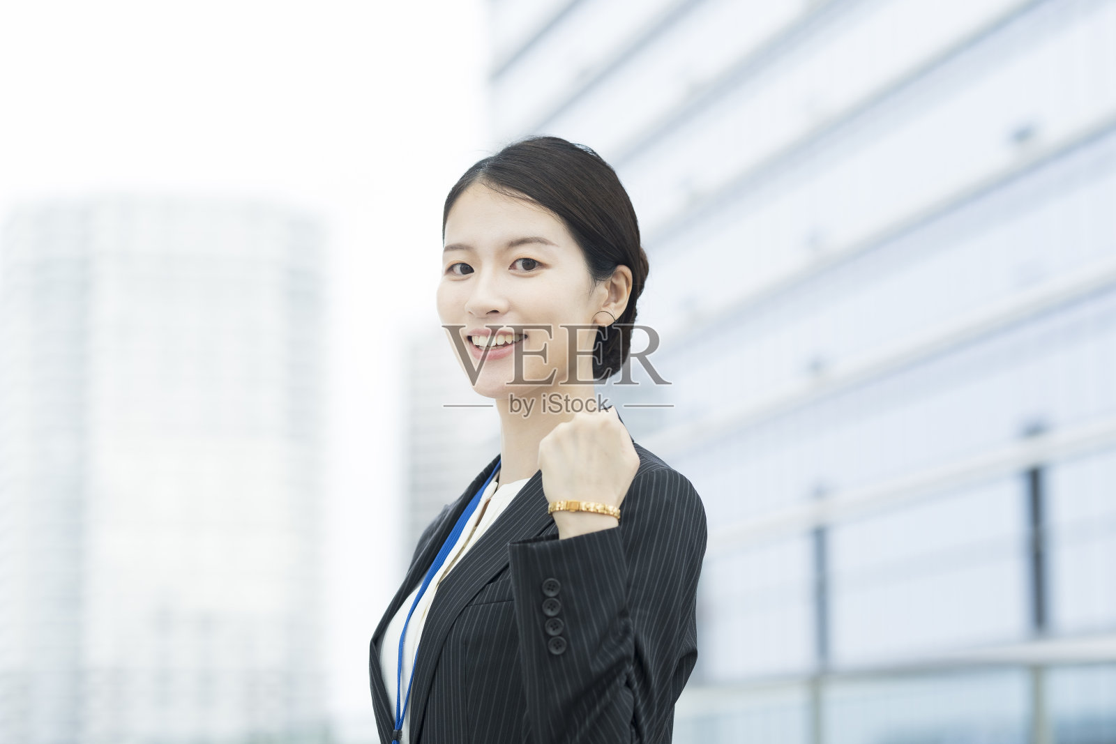 亚洲年轻的商业女性欢呼照片摄影图片