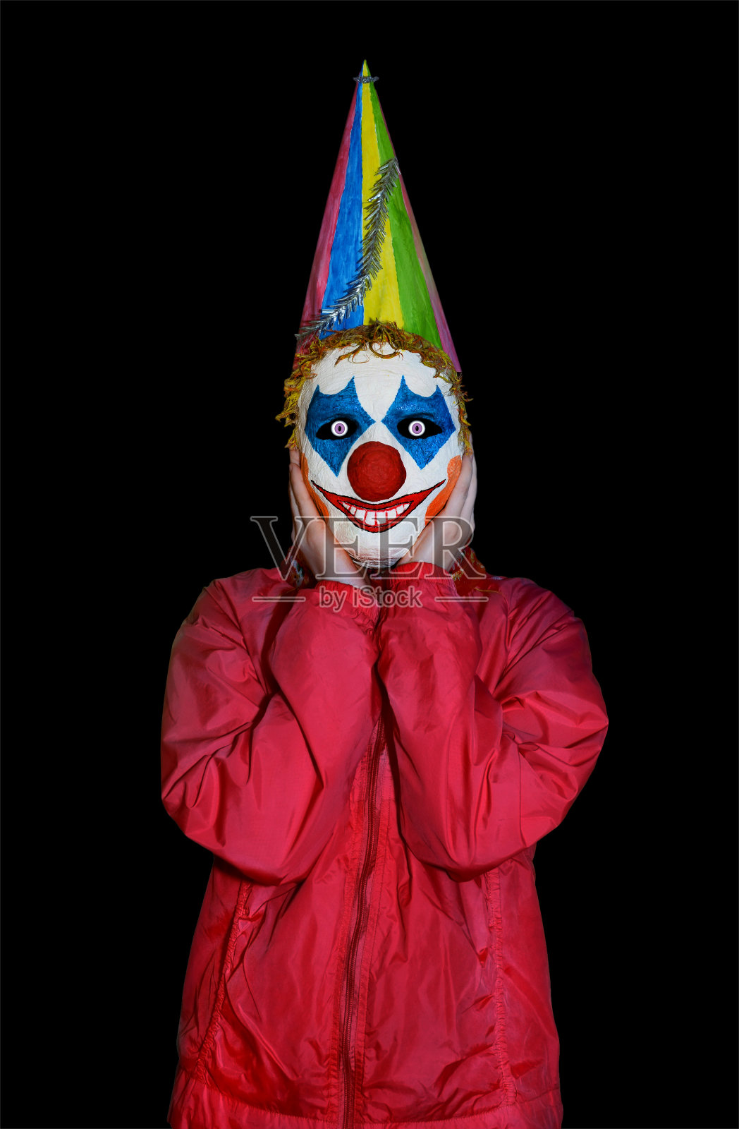 蒙面小丑惊讶的人孤立的黑色背景照片摄影图片