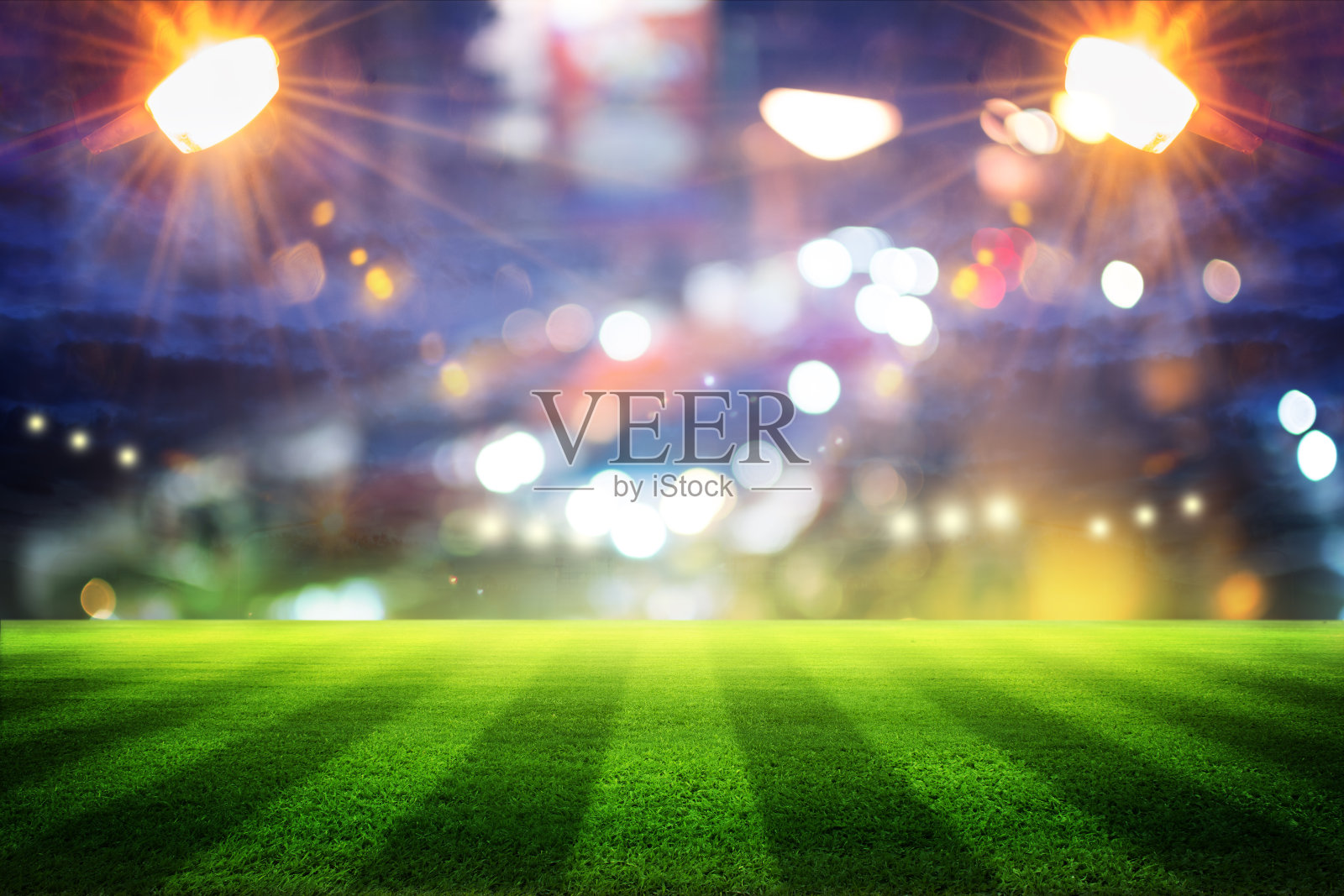 晚上的灯光和3D足球场照片摄影图片