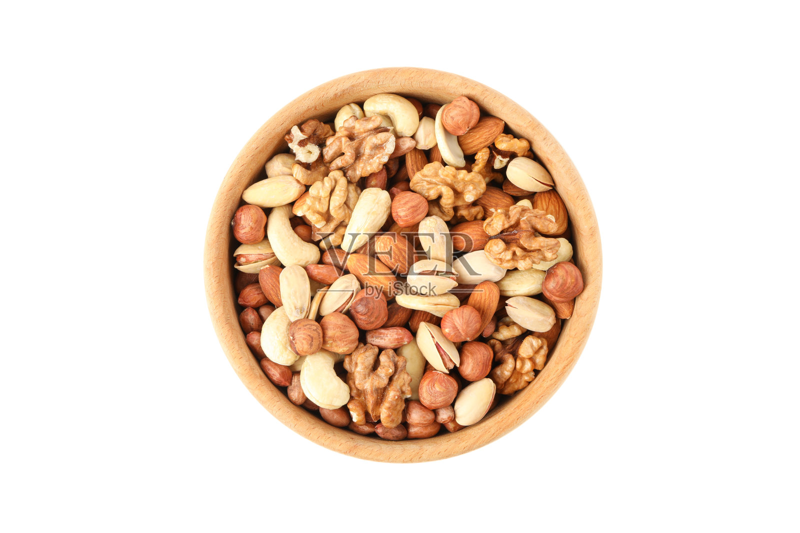 碗与不同的坚果孤立在白色背景。维生素的食物照片摄影图片