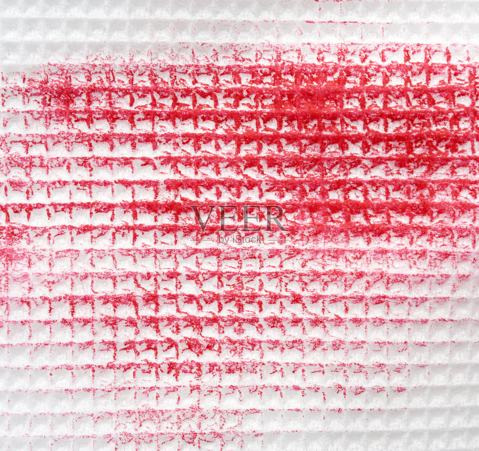 白色纸巾上的红色唇膏照片摄影图片