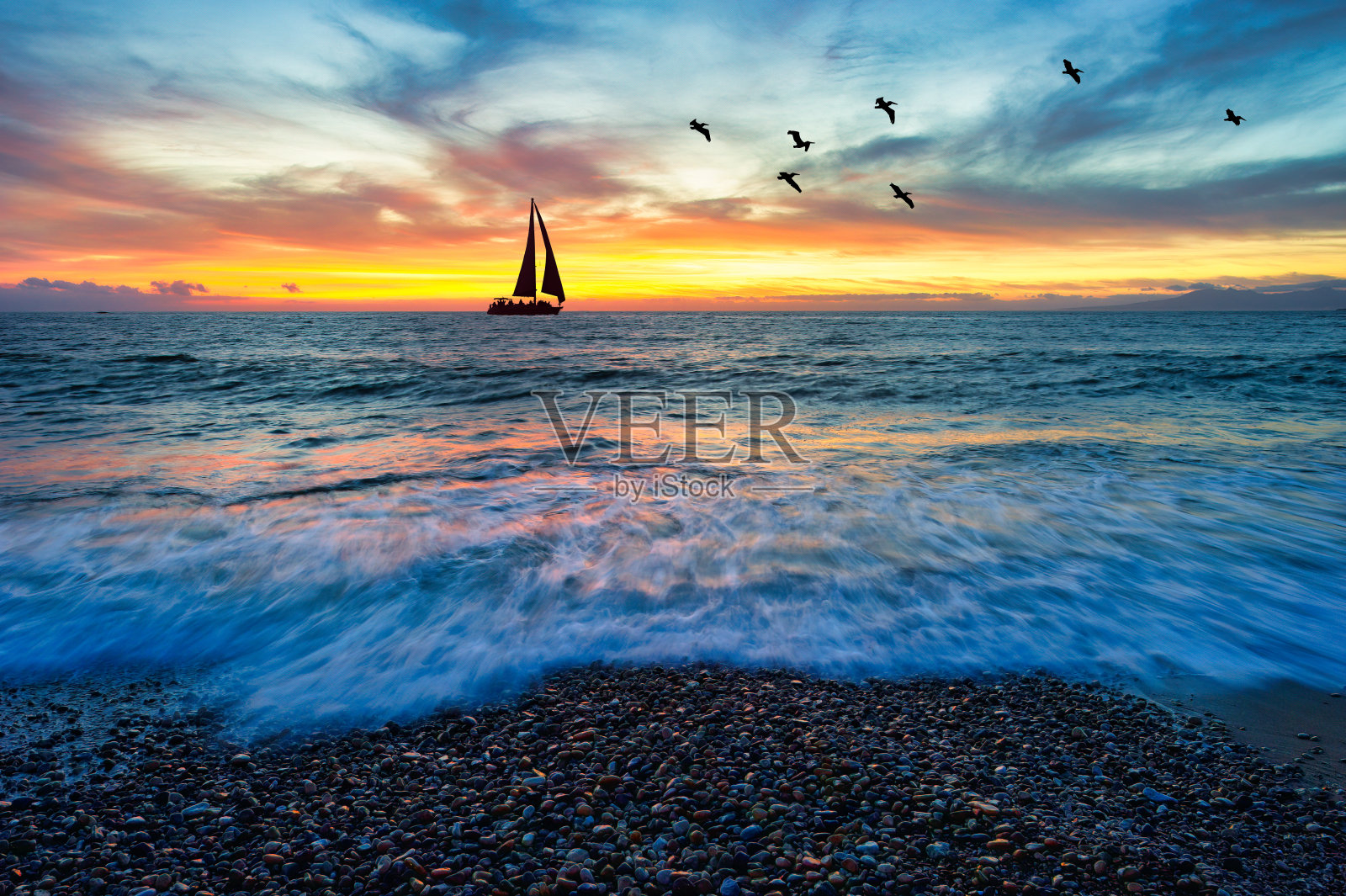 日落帆船海景照片摄影图片