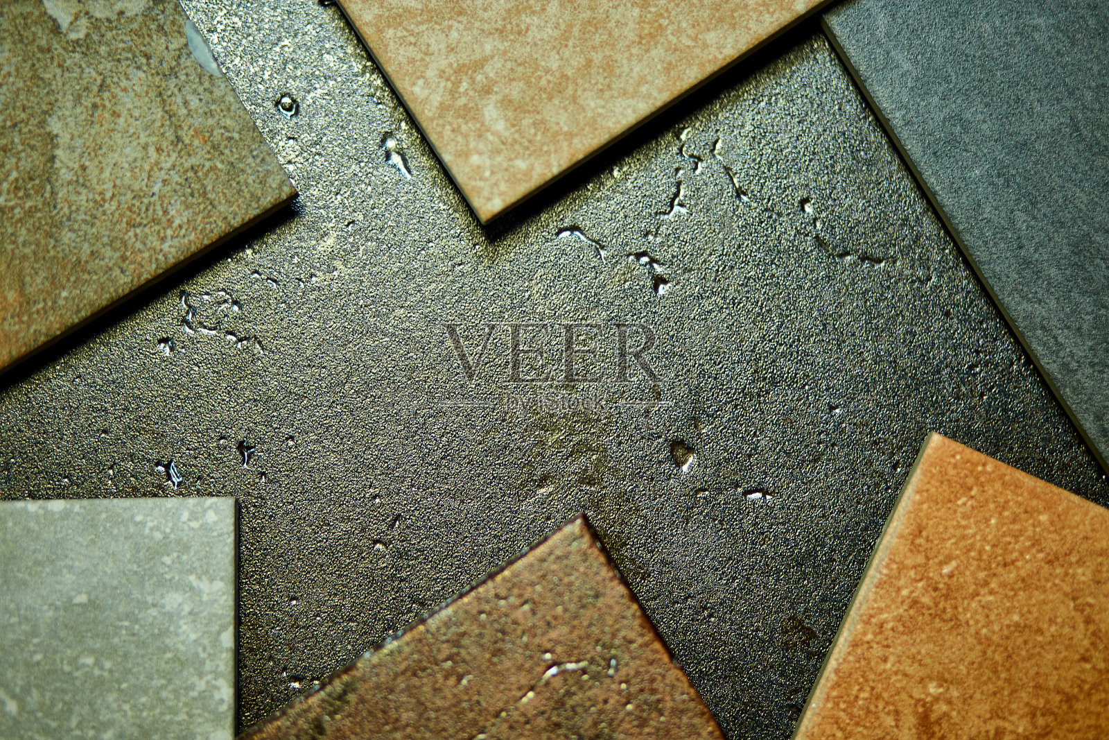 各种不同的装饰瓷砖样品框架上的石材背景。照片摄影图片