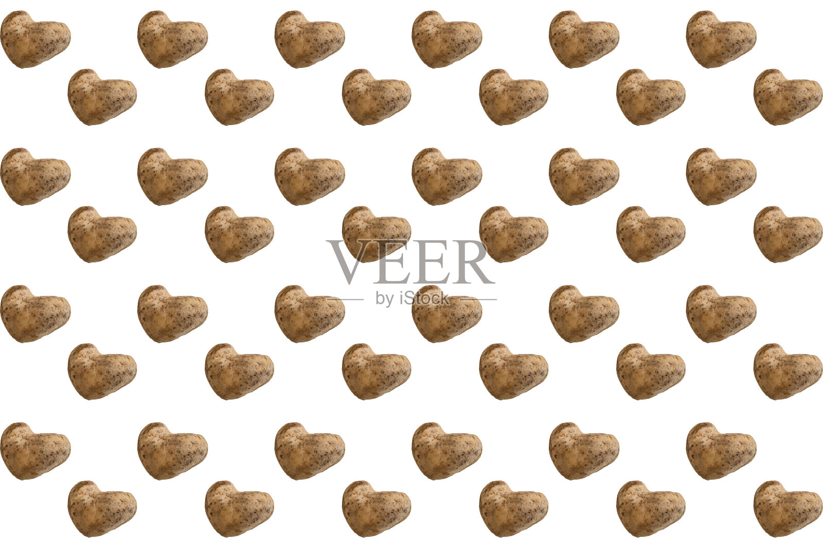 白色背景上的丑陋的心形土豆的无缝图案。使用有机丑陋蔬菜的概念。横向框架照片摄影图片