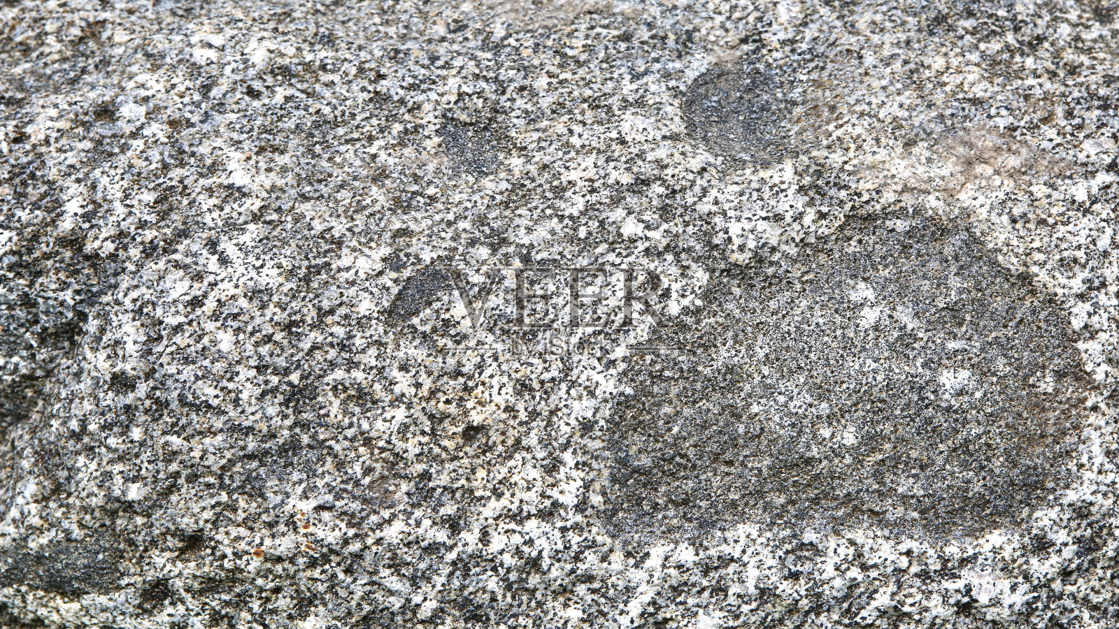 天然花岗石表面。照片摄影图片