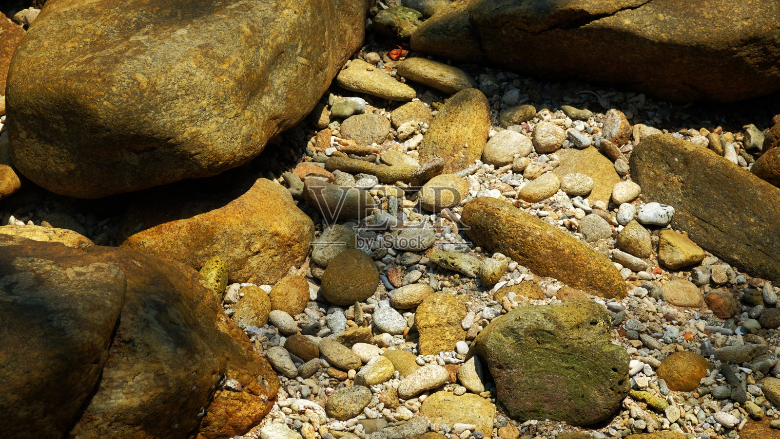 石礁海滩背景装饰以自然为主题理念。照片摄影图片