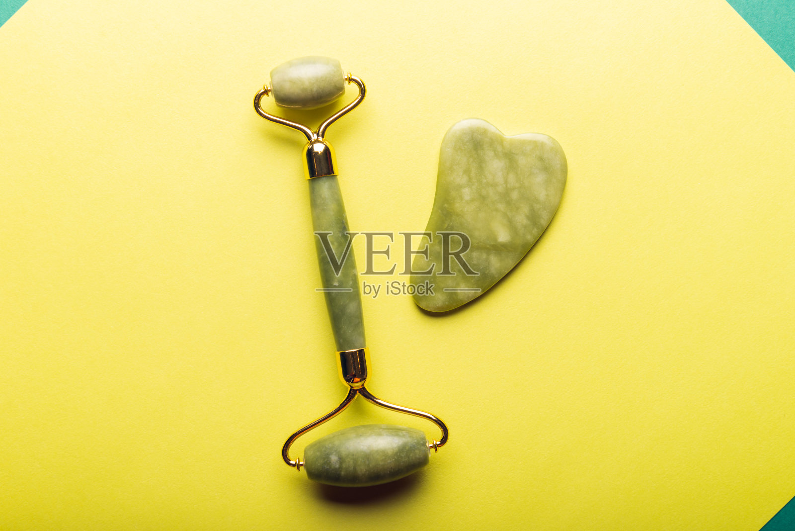 玉面滚轮和刮痧石照片摄影图片