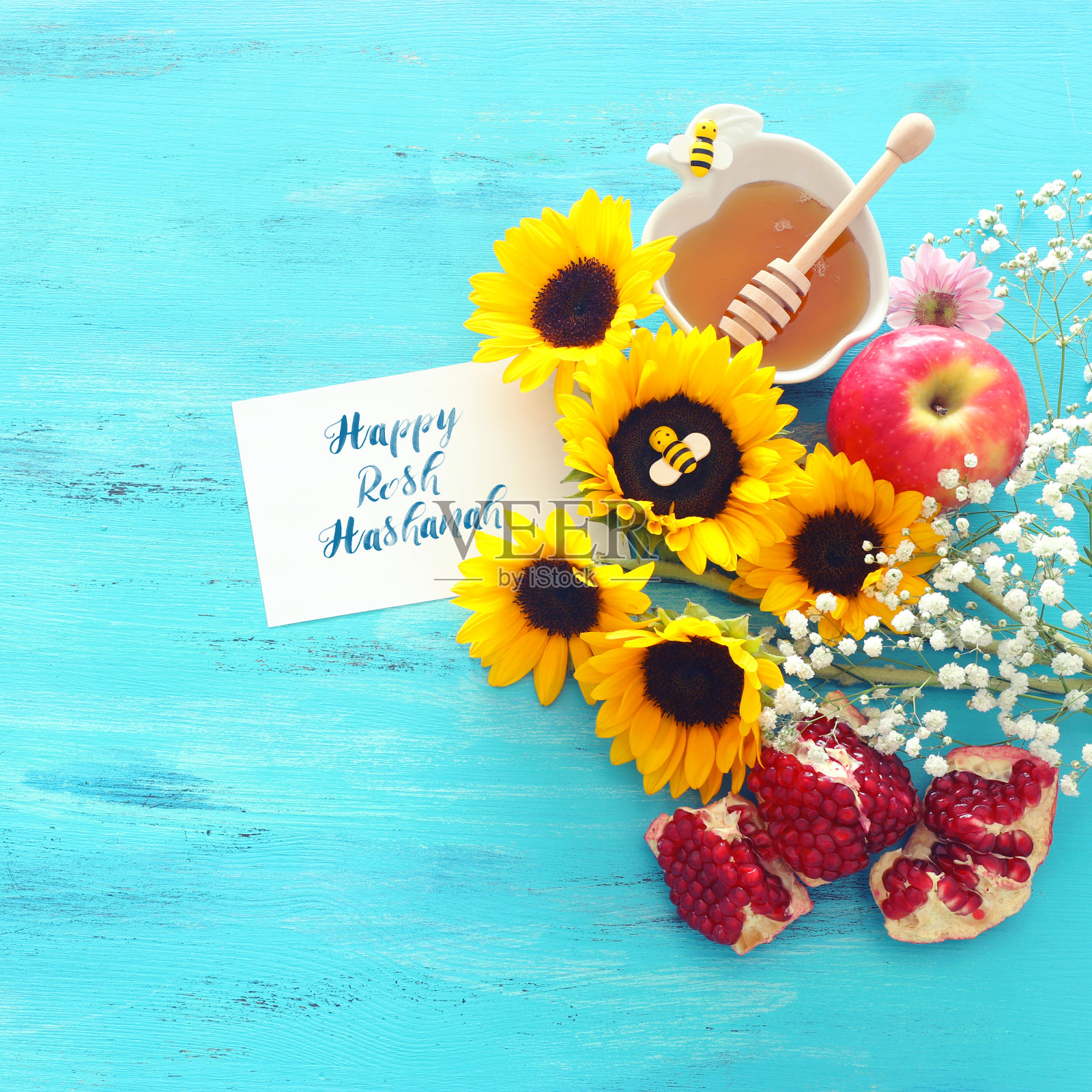 犹太节日的概念——蜂蜜传统节日的象征照片摄影图片