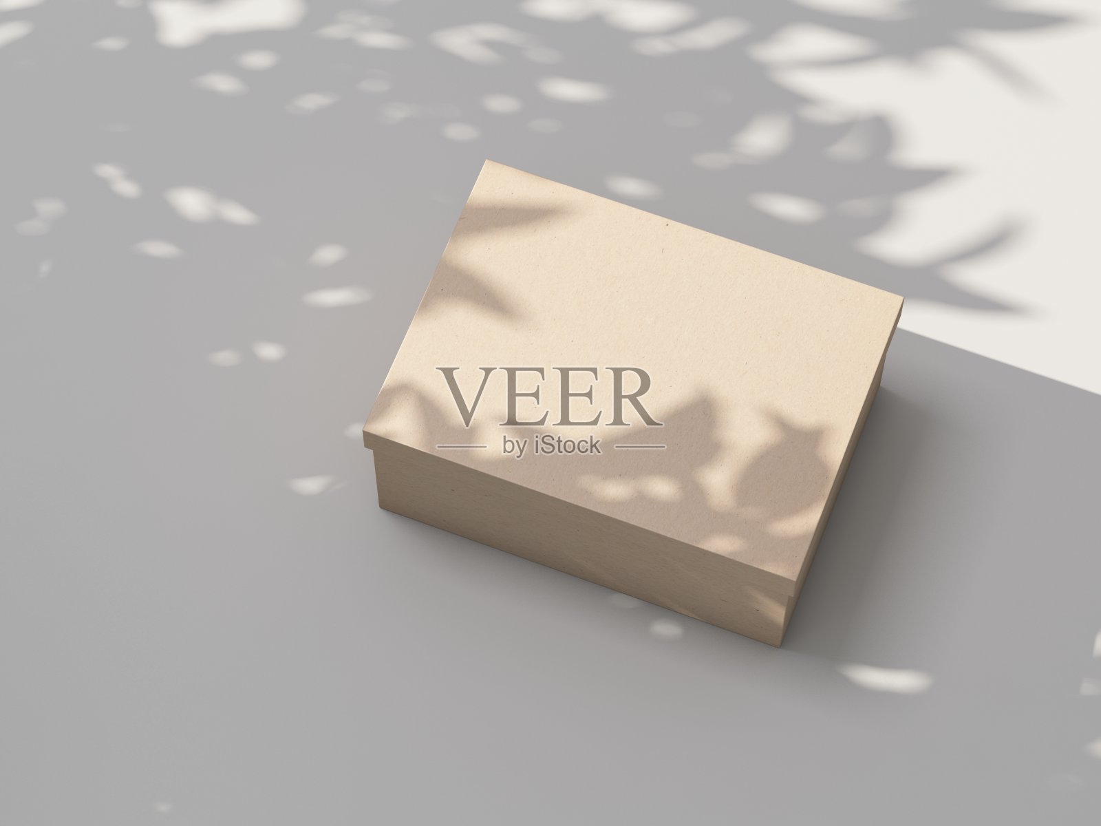 牛皮纸纸盒模型在户外白色桌子上照片摄影图片