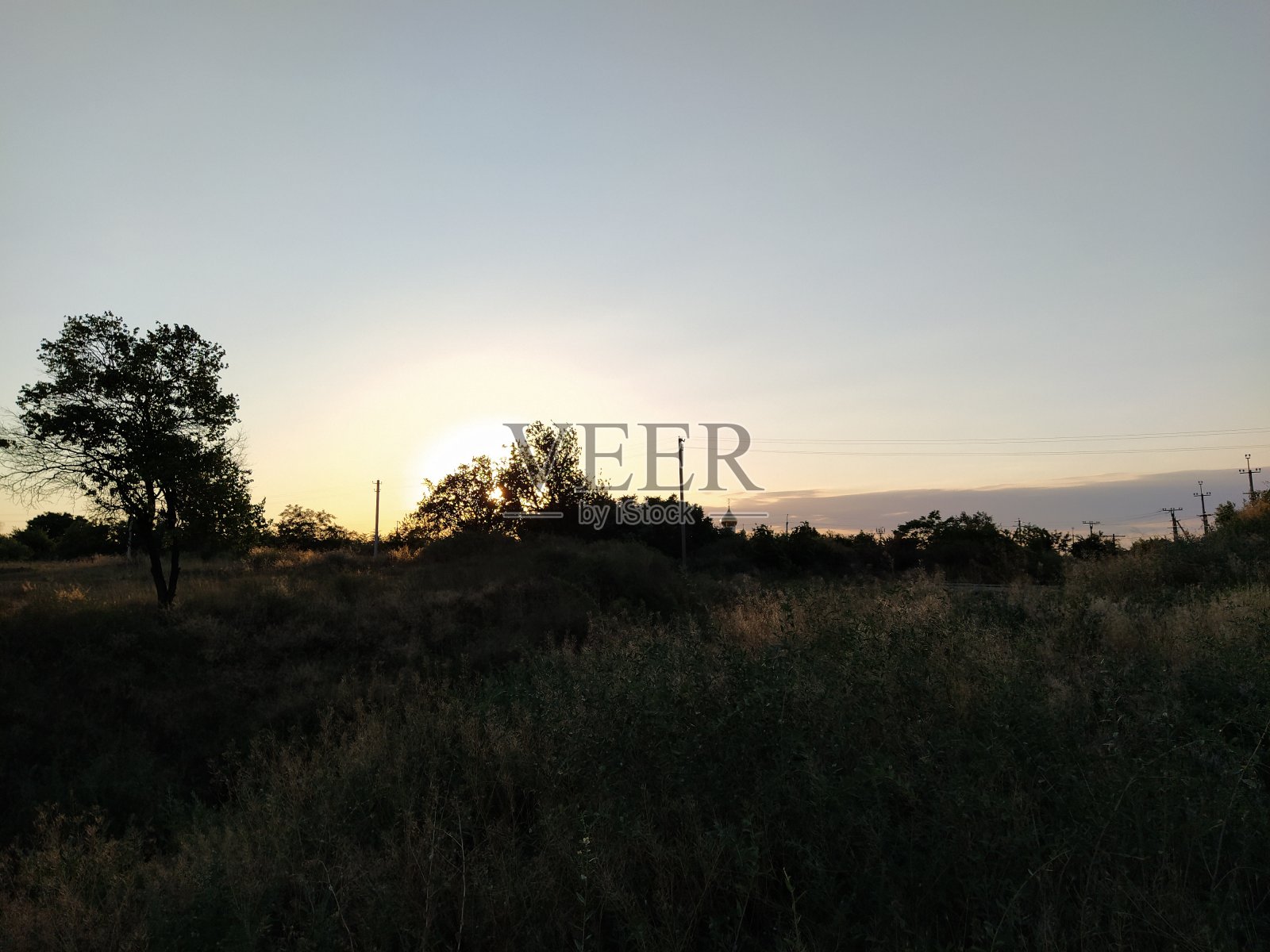 日落时分教堂的乡村景观照片摄影图片