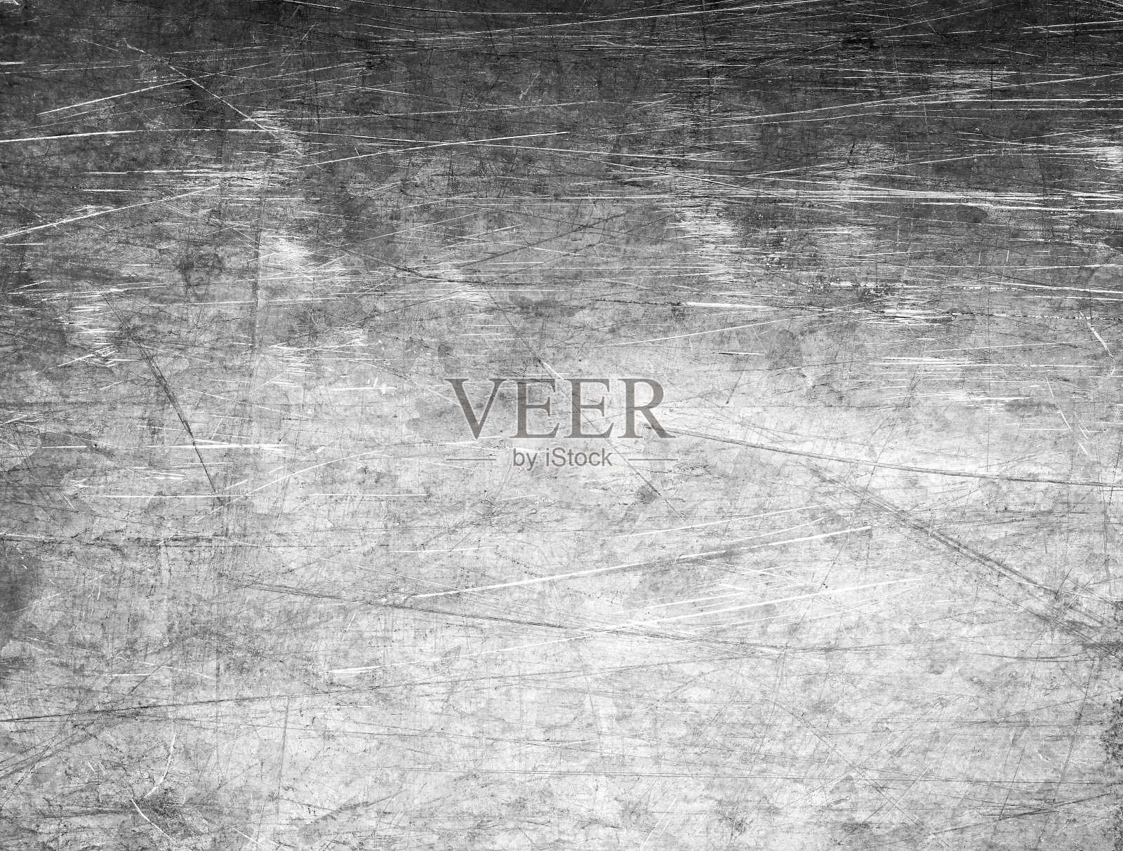 近距离观察闪亮的黑色磨损和划伤的金属表面照片摄影图片