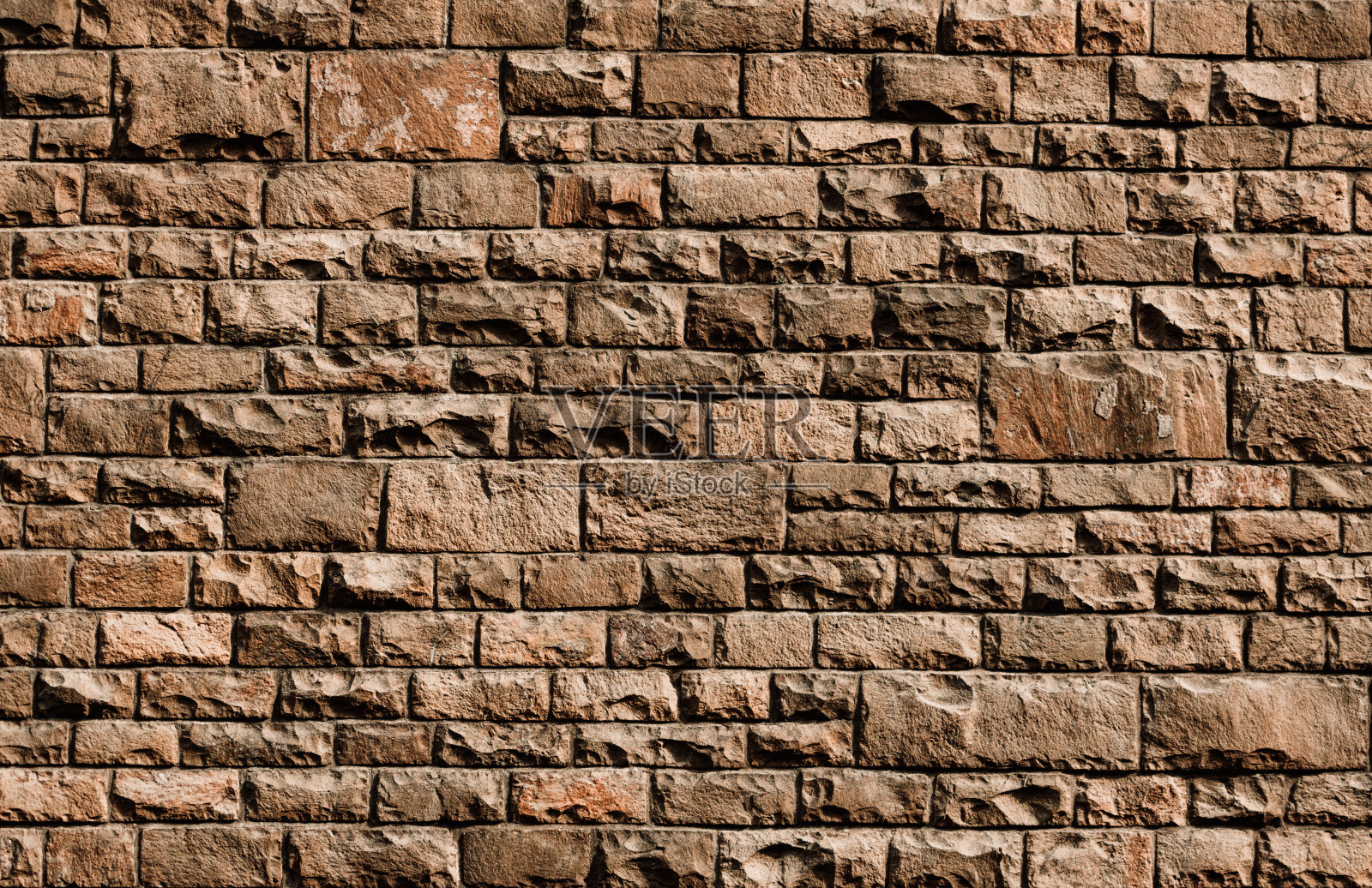 背景-古老的石墙与不同的石头大小照片摄影图片