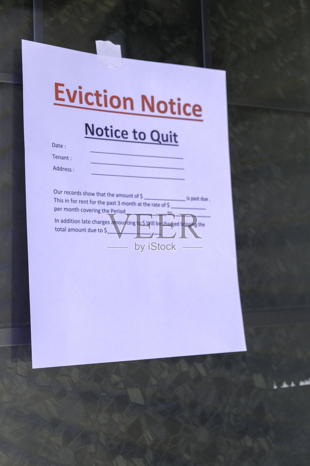 驱逐通知与现金加元支付未偿和计算器照片摄影图片