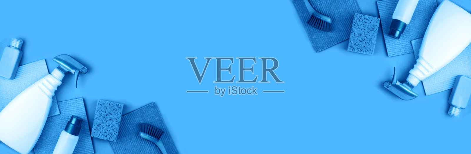 用清洁产品制成的横幅以蓝色为背景。照片摄影图片