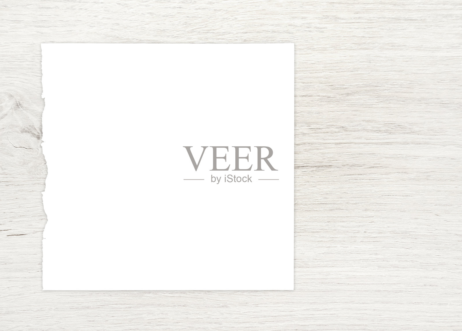 白纸在木头上。照片摄影图片