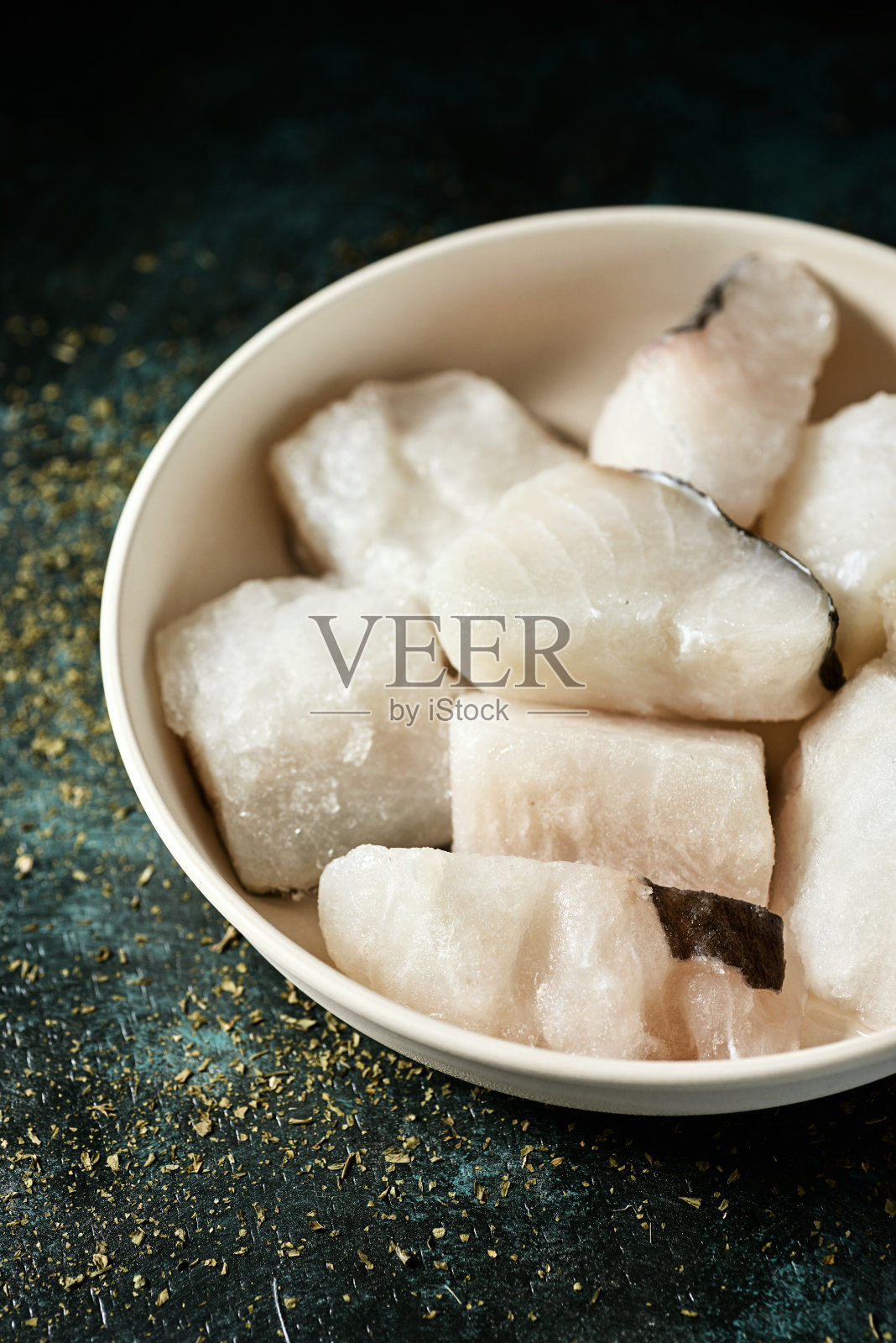 几块冷冻的生鳕鱼照片摄影图片