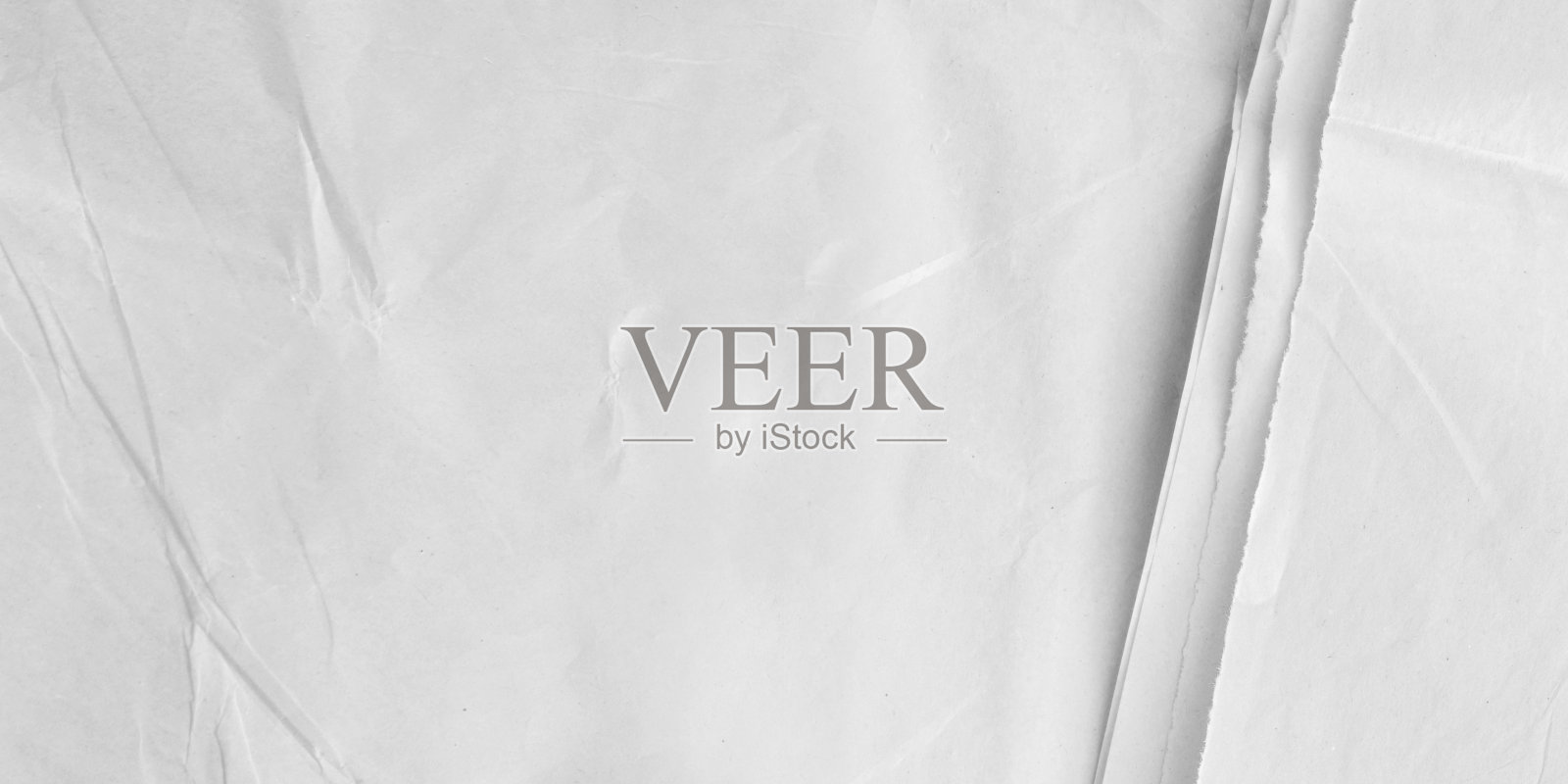 背景与散落的皱巴巴的纸覆盖。照片摄影图片