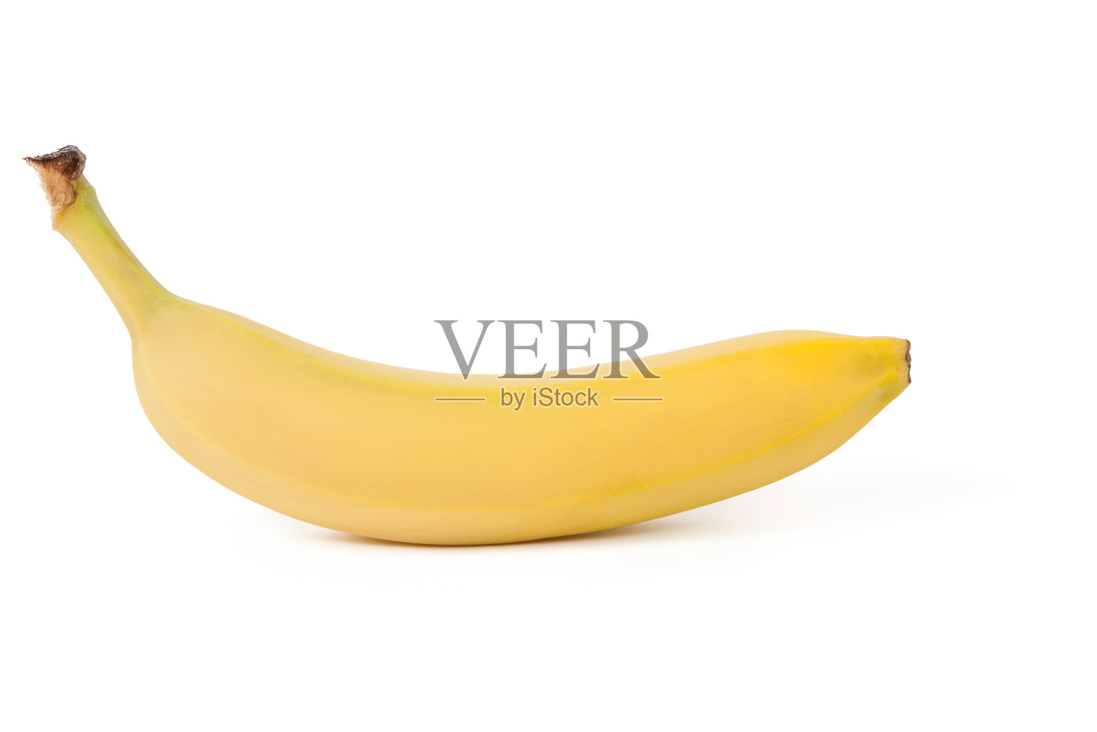 新鲜的黄色香蕉在一个白色孤立的背景。健康食品和素食主义。照片摄影图片