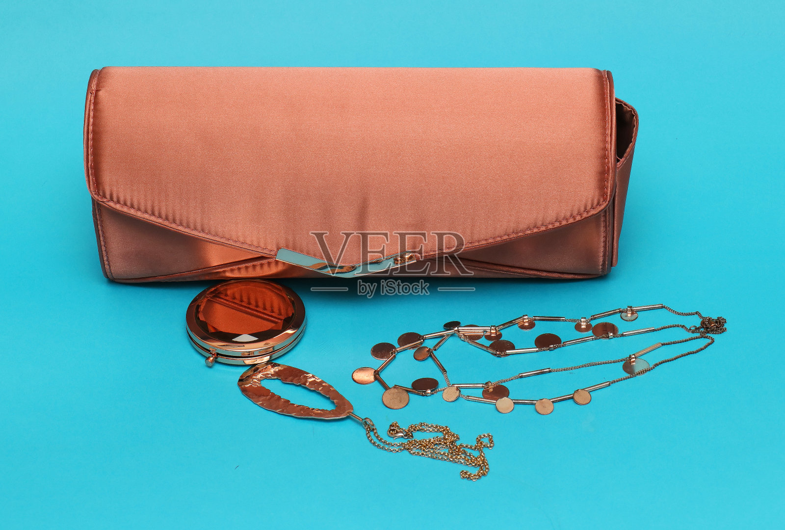 粉色包，玫瑰金首饰照片摄影图片