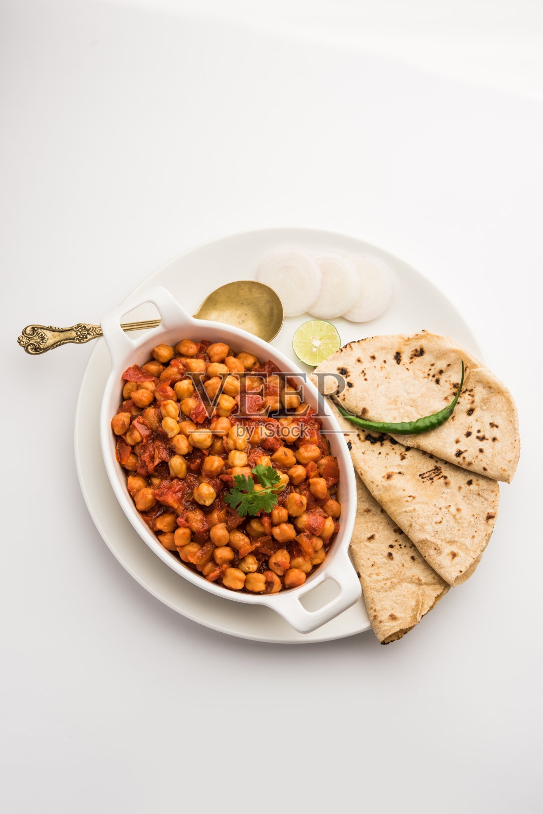 Chana Masala，鹰嘴豆咖喱或Choley。印度的传统食品照片摄影图片