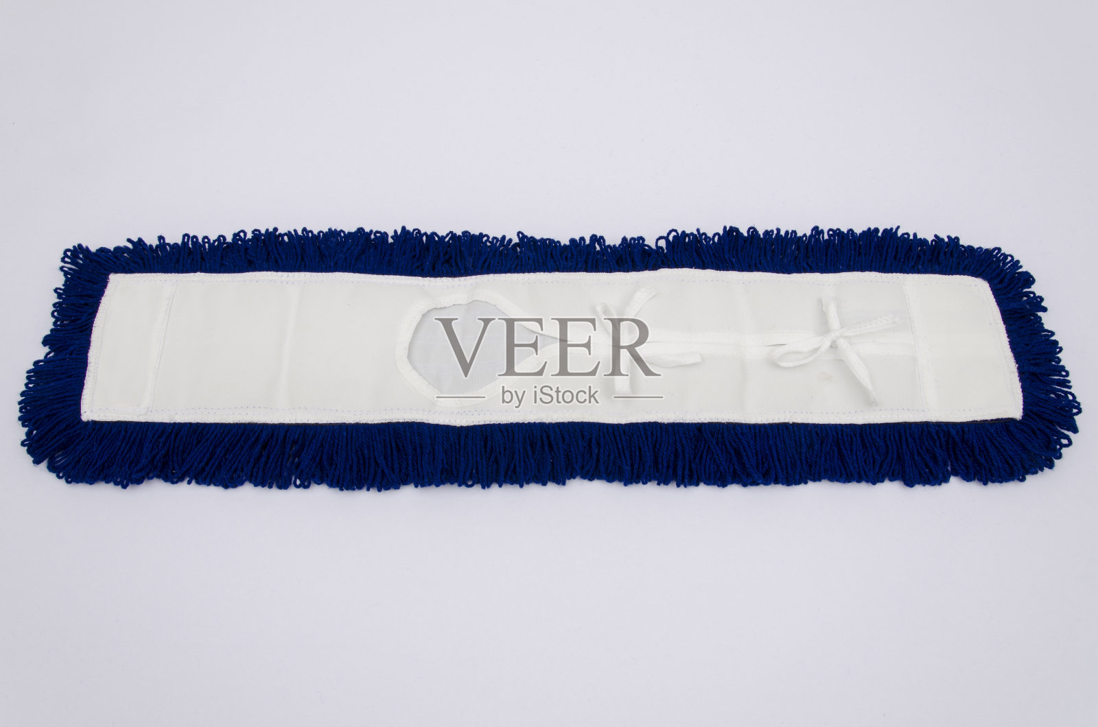 在白色背景上拖把细节照片摄影图片