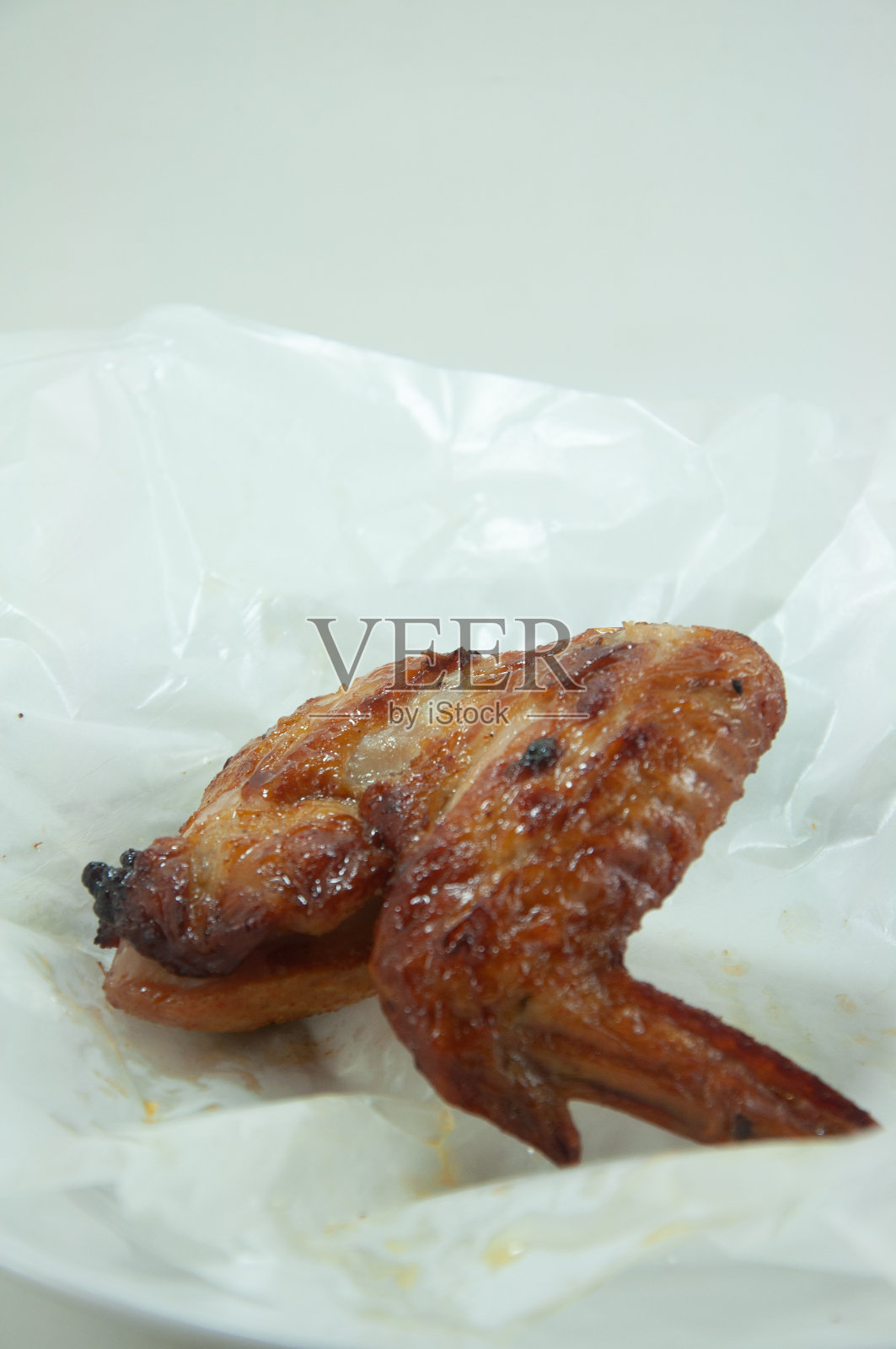 烤鸡与烧烤酱纸照片摄影图片