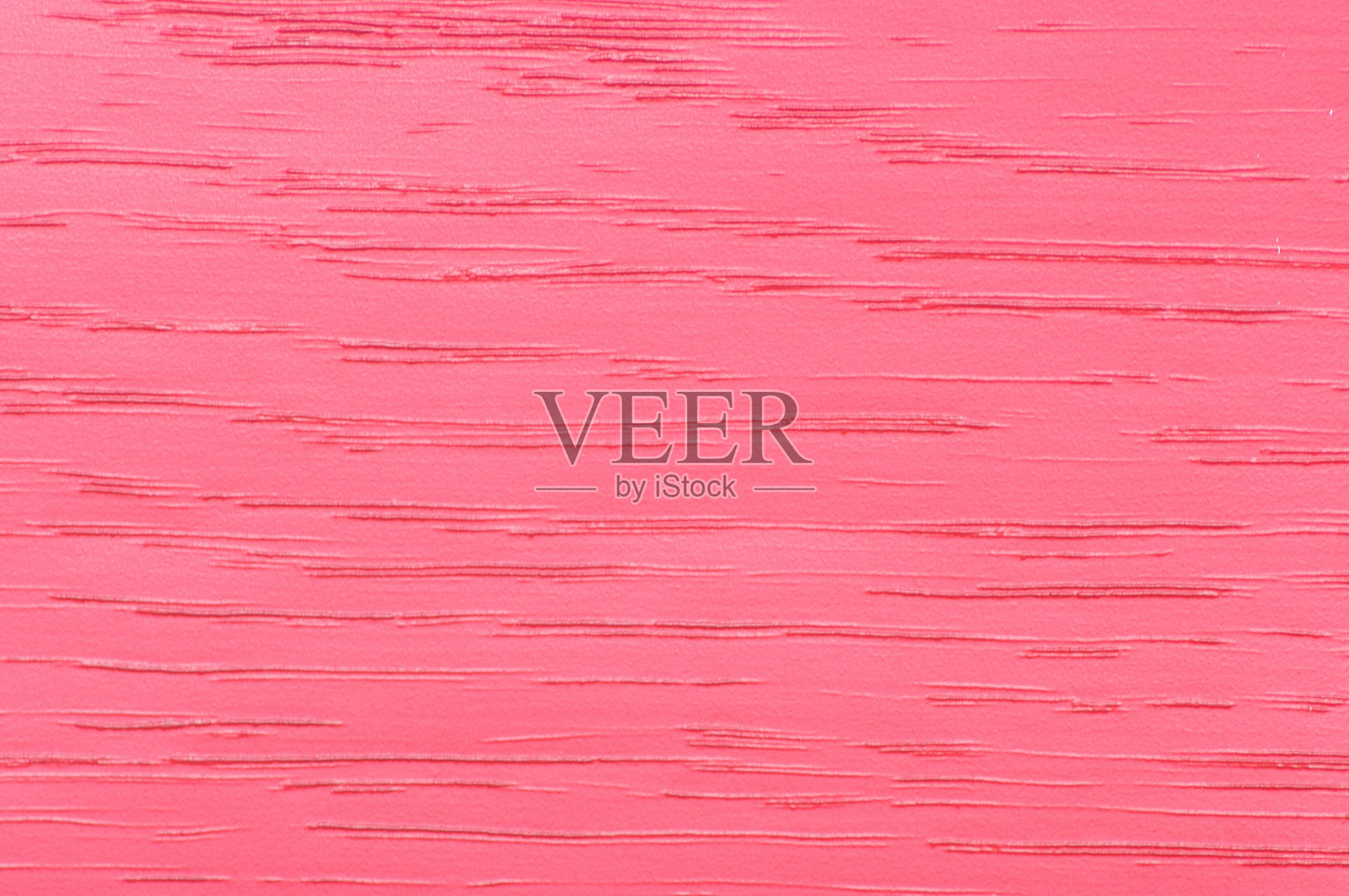 人工漆红色抛光木材表面具有明显的自然图案。照片摄影图片