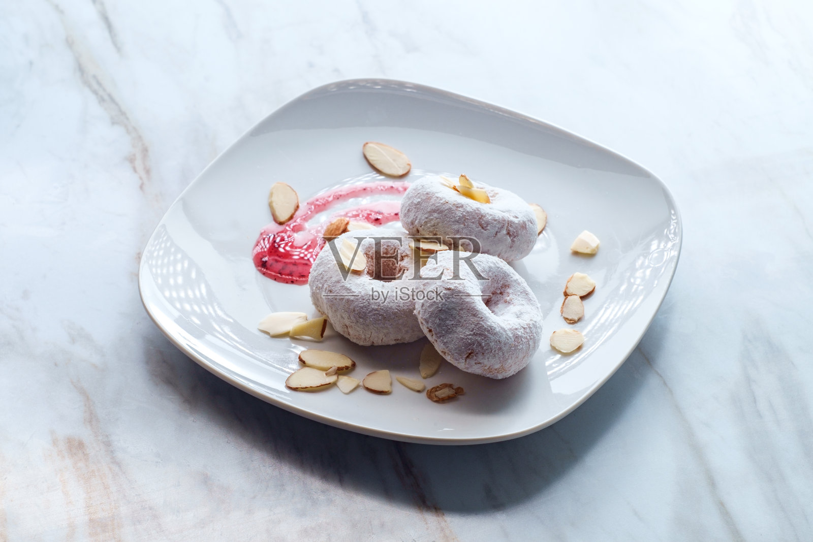 糖粉蛋糕甜甜圈照片摄影图片