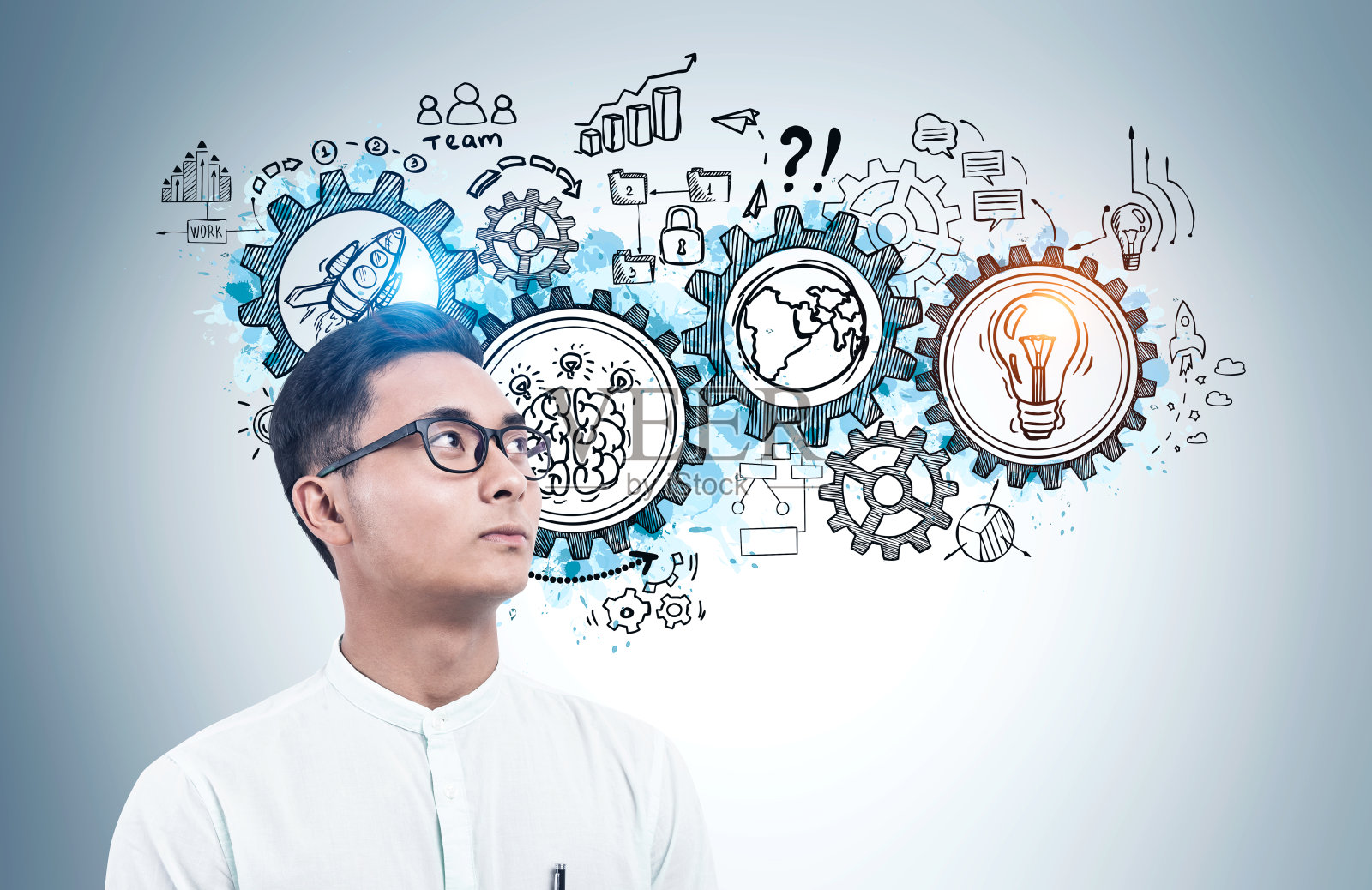 亚洲商人看齿轮草图照片摄影图片