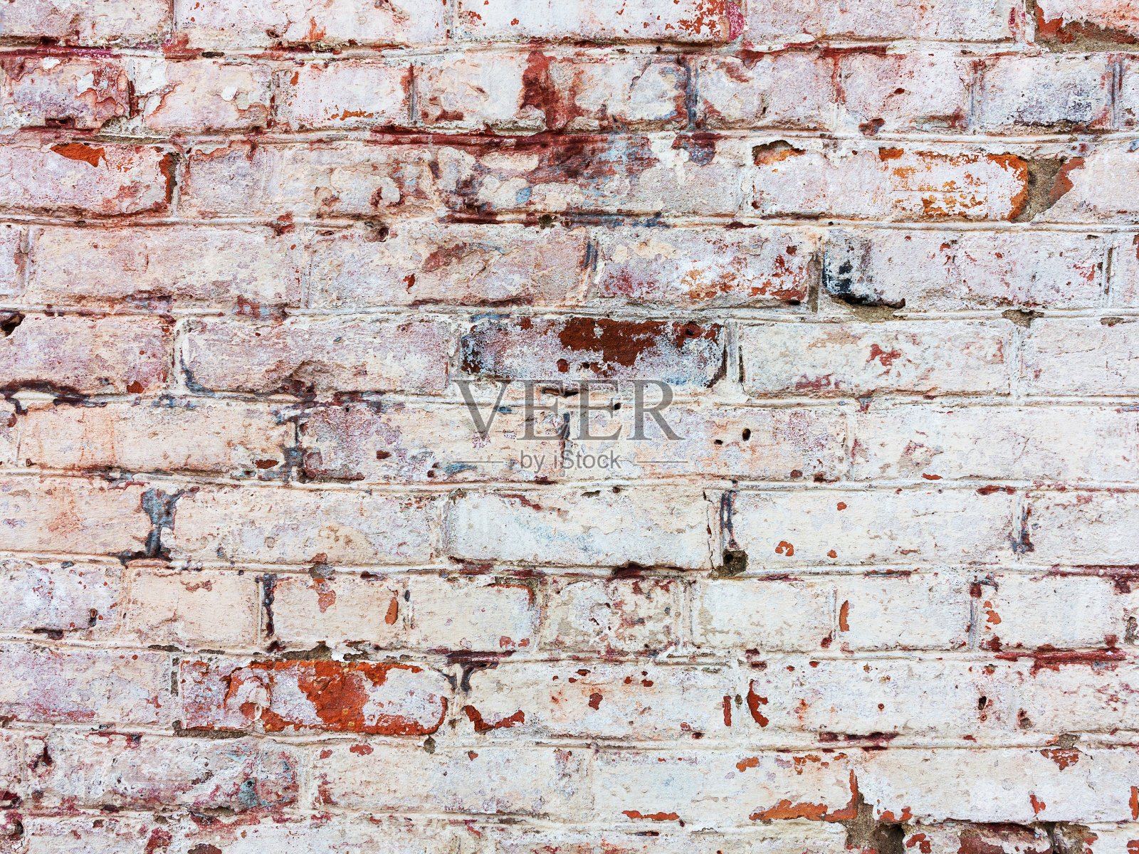 砖墙，饱经风霜，墙面破损油漆。枯燥乏味的混凝土表面。很棒的背景或纹理。照片摄影图片