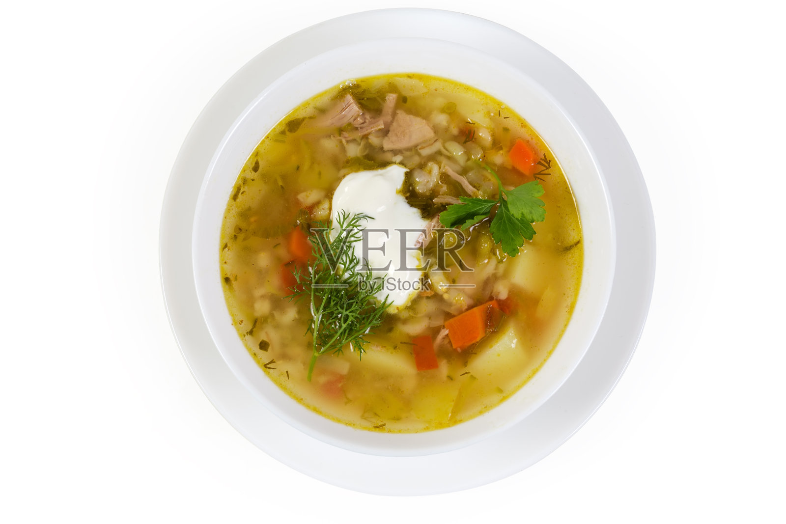 俯视图的rassolnik部分调味酸奶油照片摄影图片